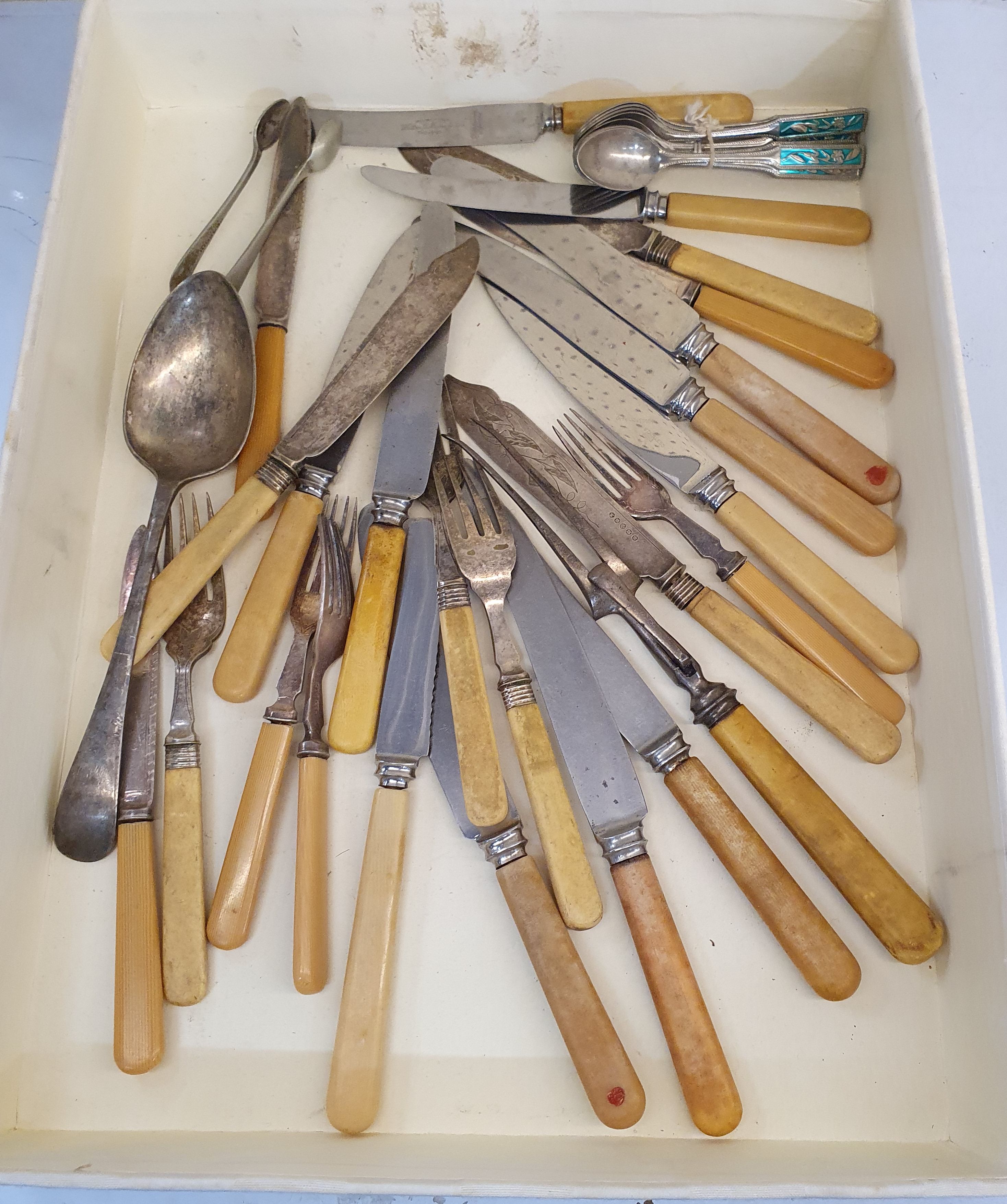 64 · A BOX OF BONE HANDLE CUTLERY