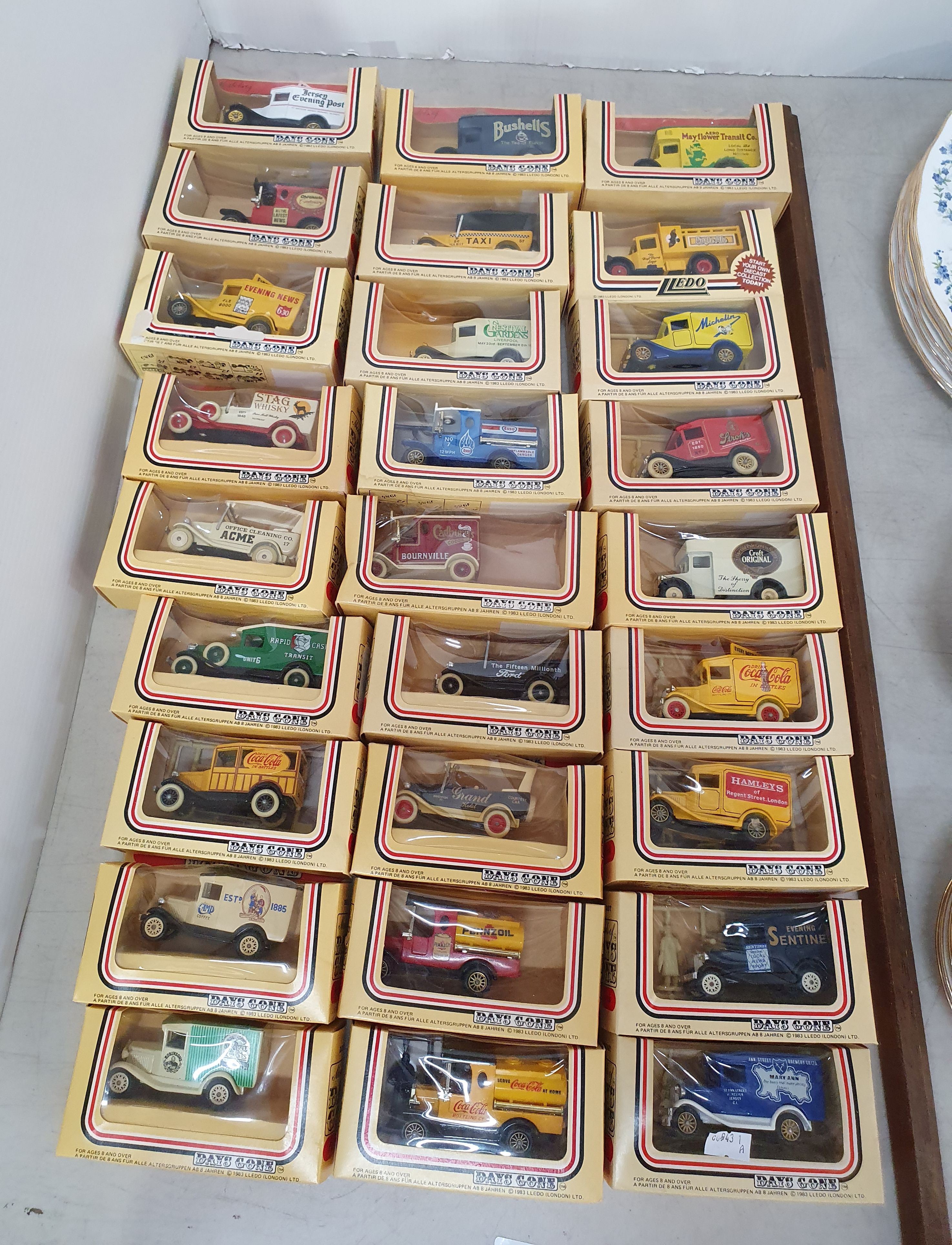 137 · 27 'DAYS GONE' DIE-CAST MODEL DELIVERY VEHICLES