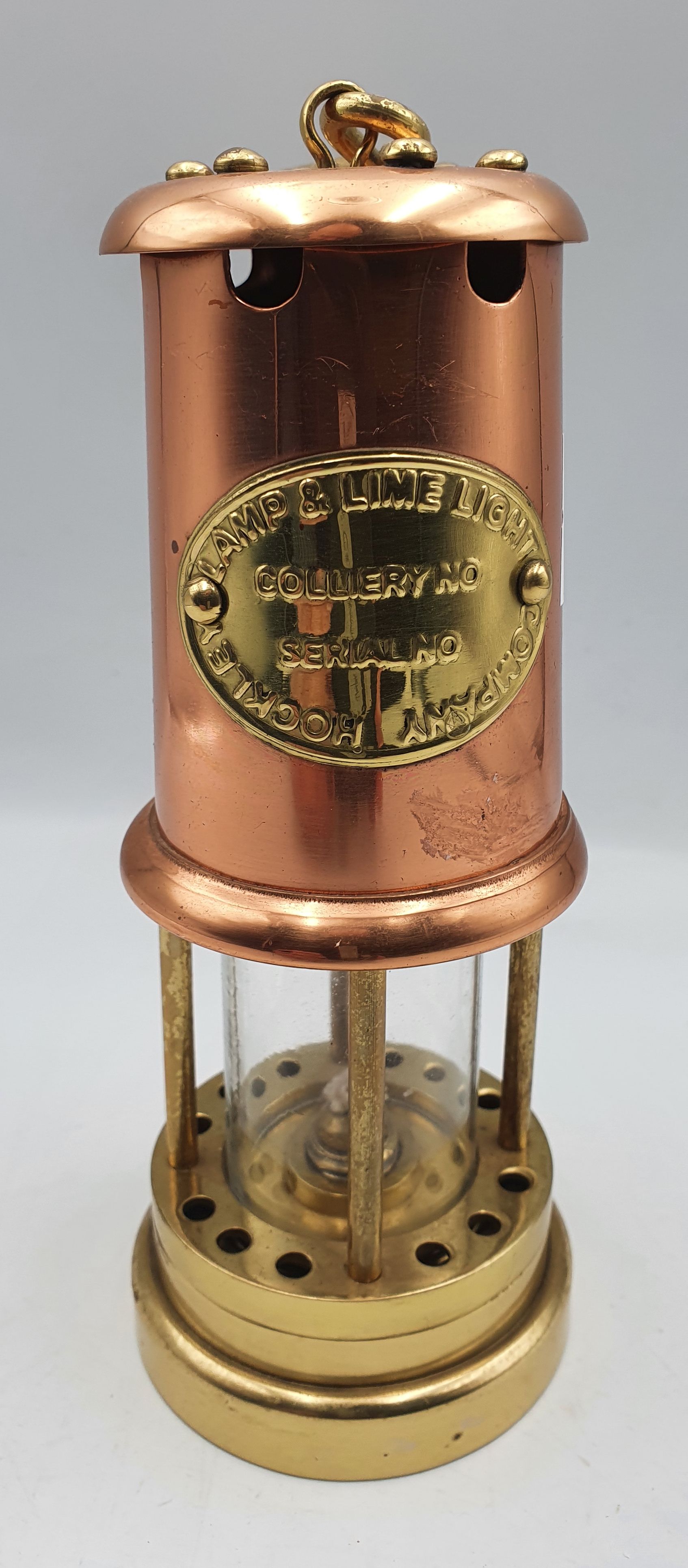 A Brass And Copper Parrafin Lamp