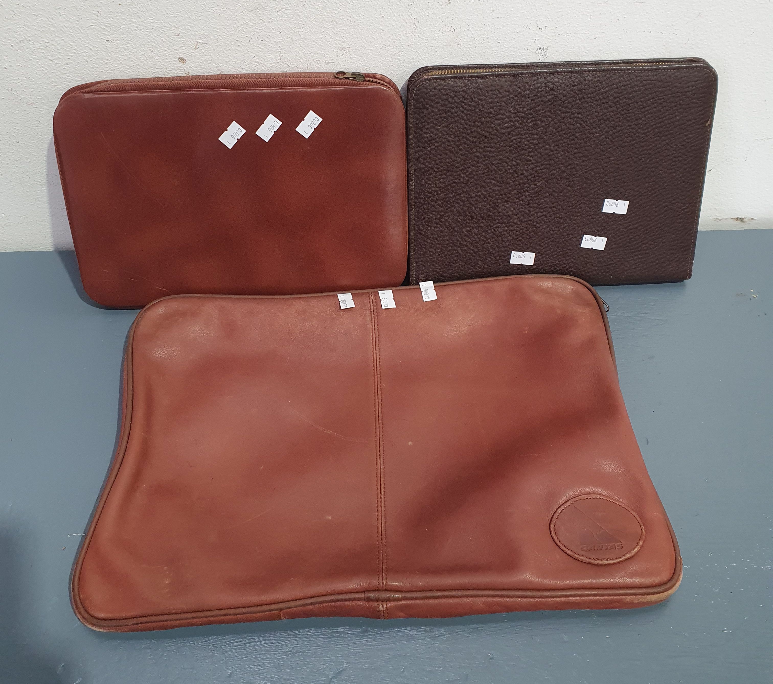 1244 · THREE VARIOUS LEATHER LAPTOP/IPAD BAGS