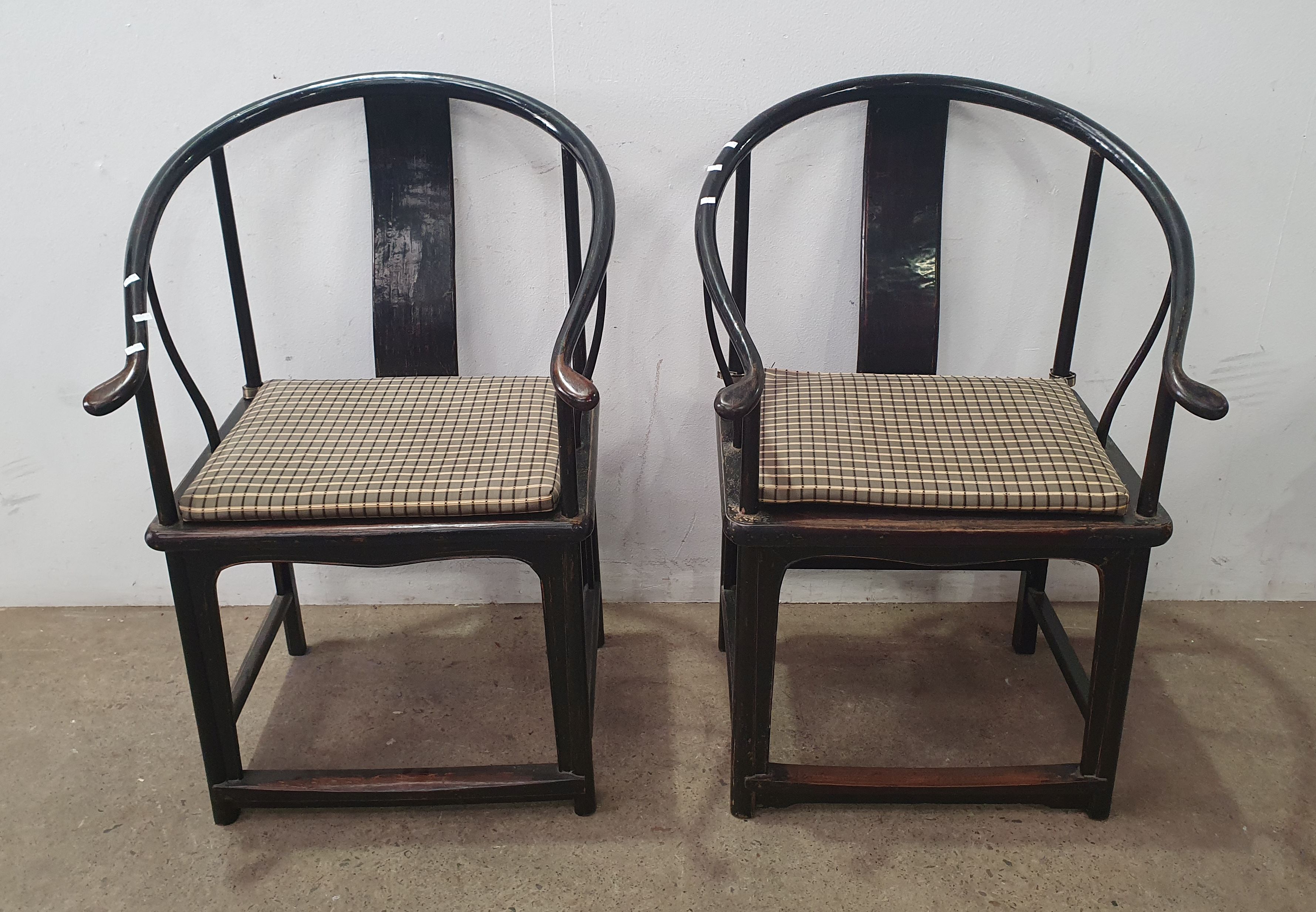 A Pair Of Chinese Black Lacquered Horseshoe Armchairs