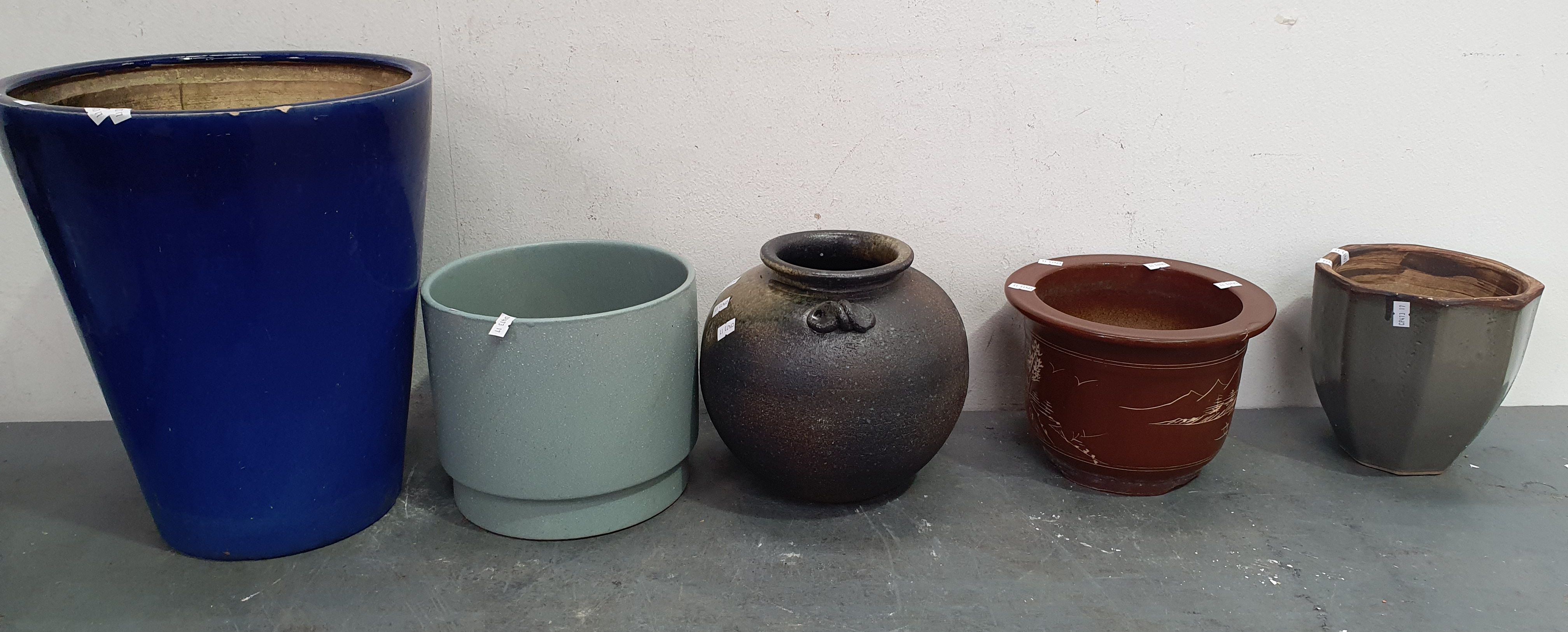 1038 · A GROUP OF GLAZED POTS