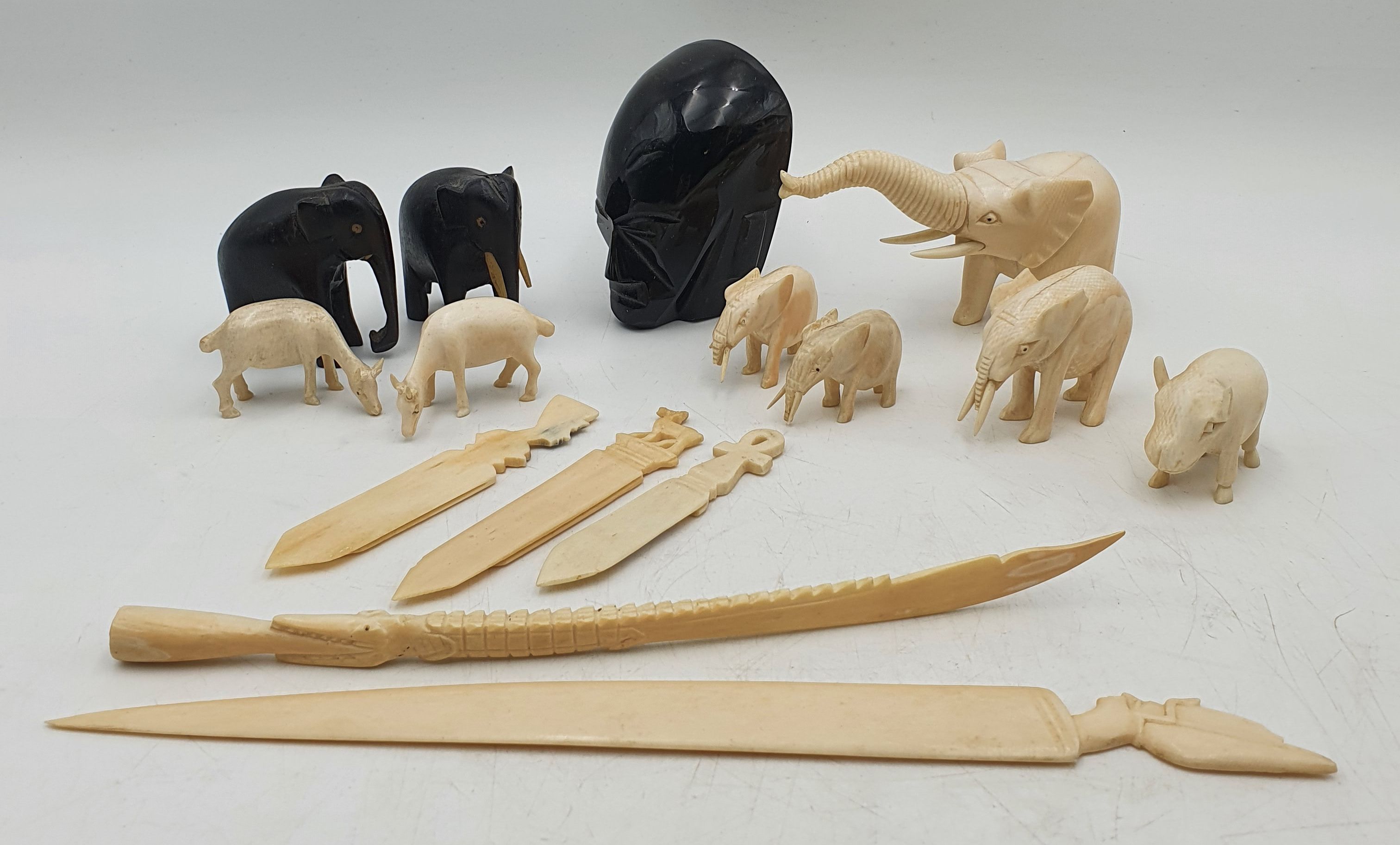 546 · A GROUP OF SMALL CARVED IVORY ANIMALS