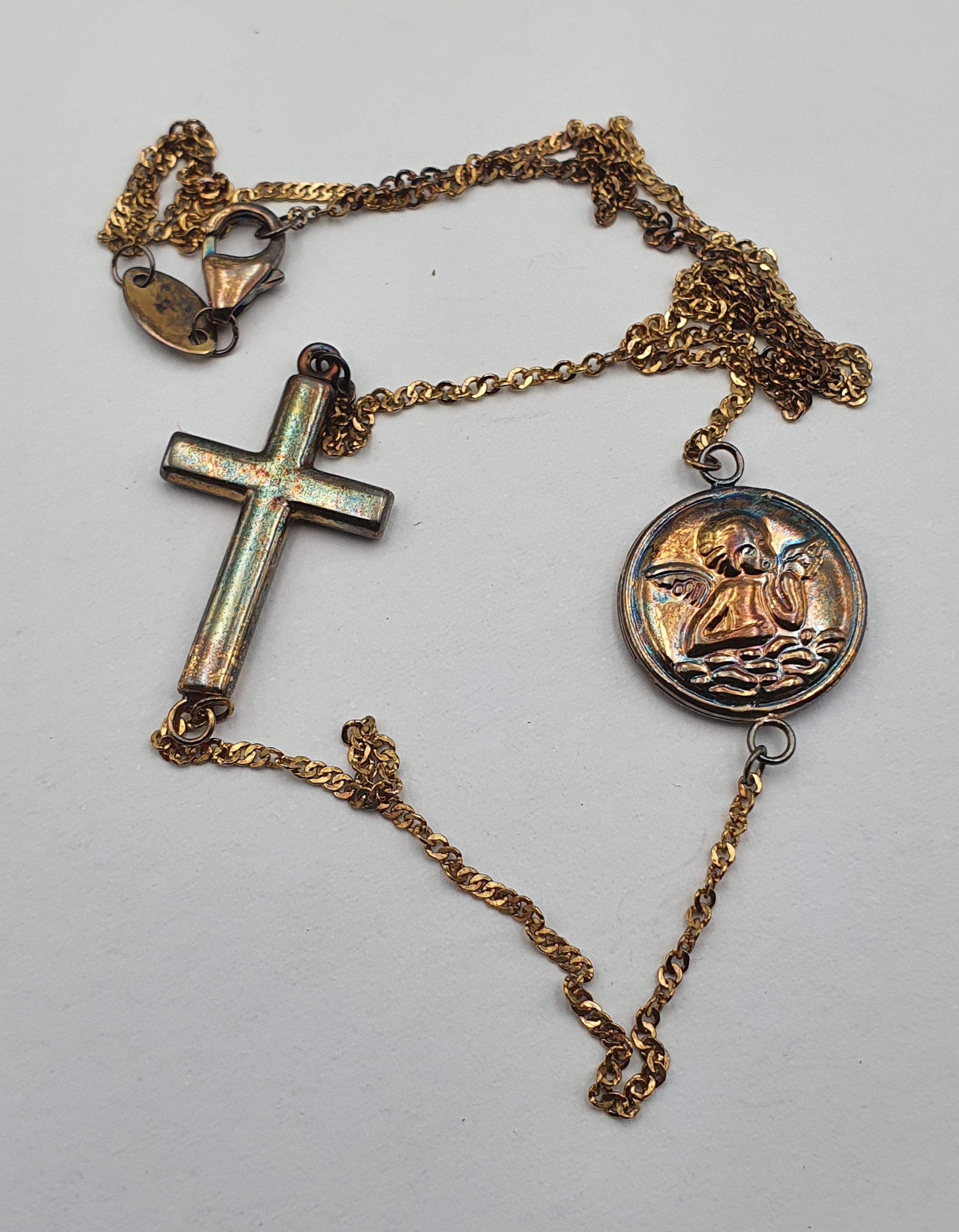 A Crucifix And Cherub Angel Sterling Silver Pendant Necklace