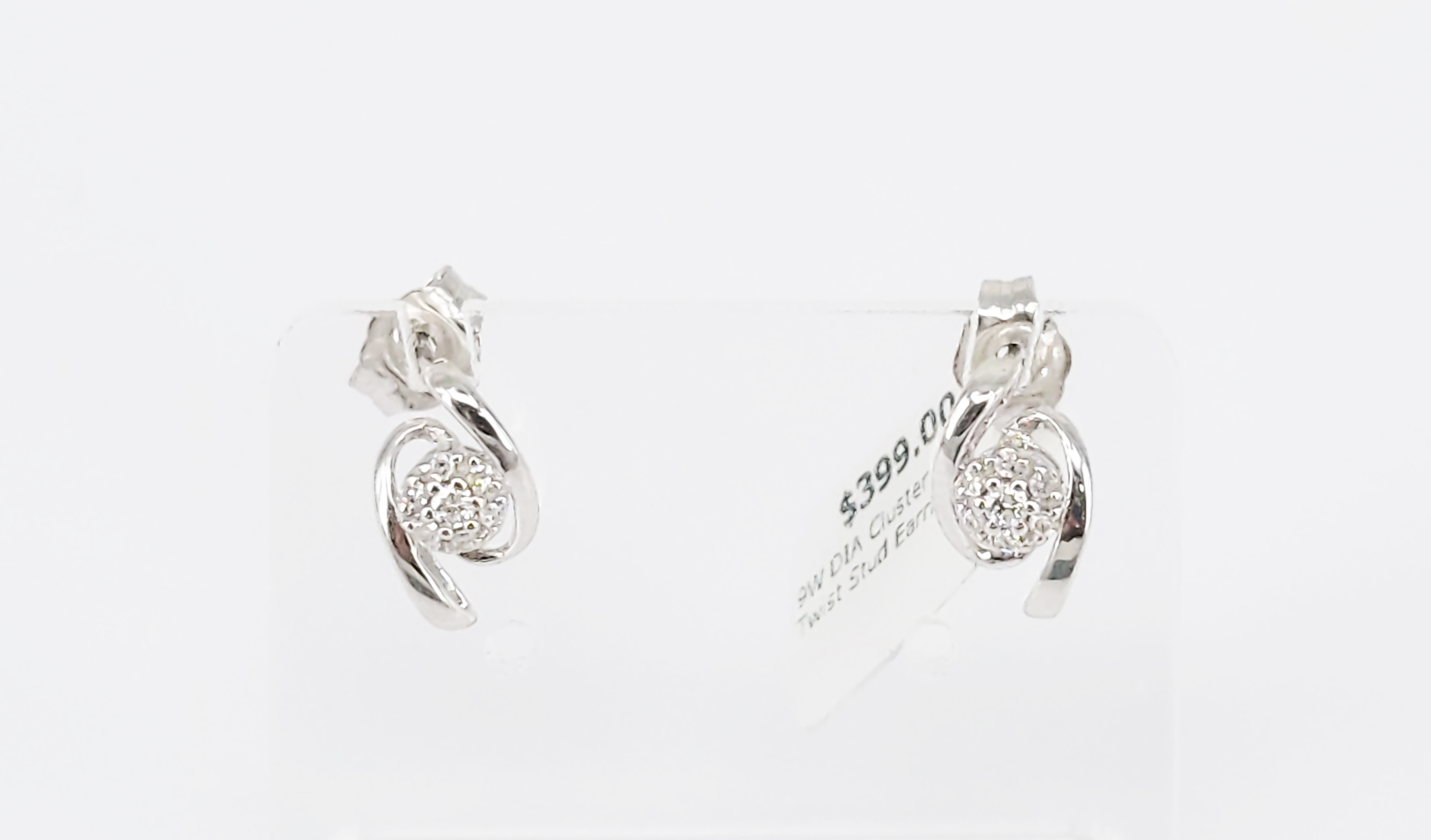 A Pair Of 9ct White Gold Ribbon Earrings