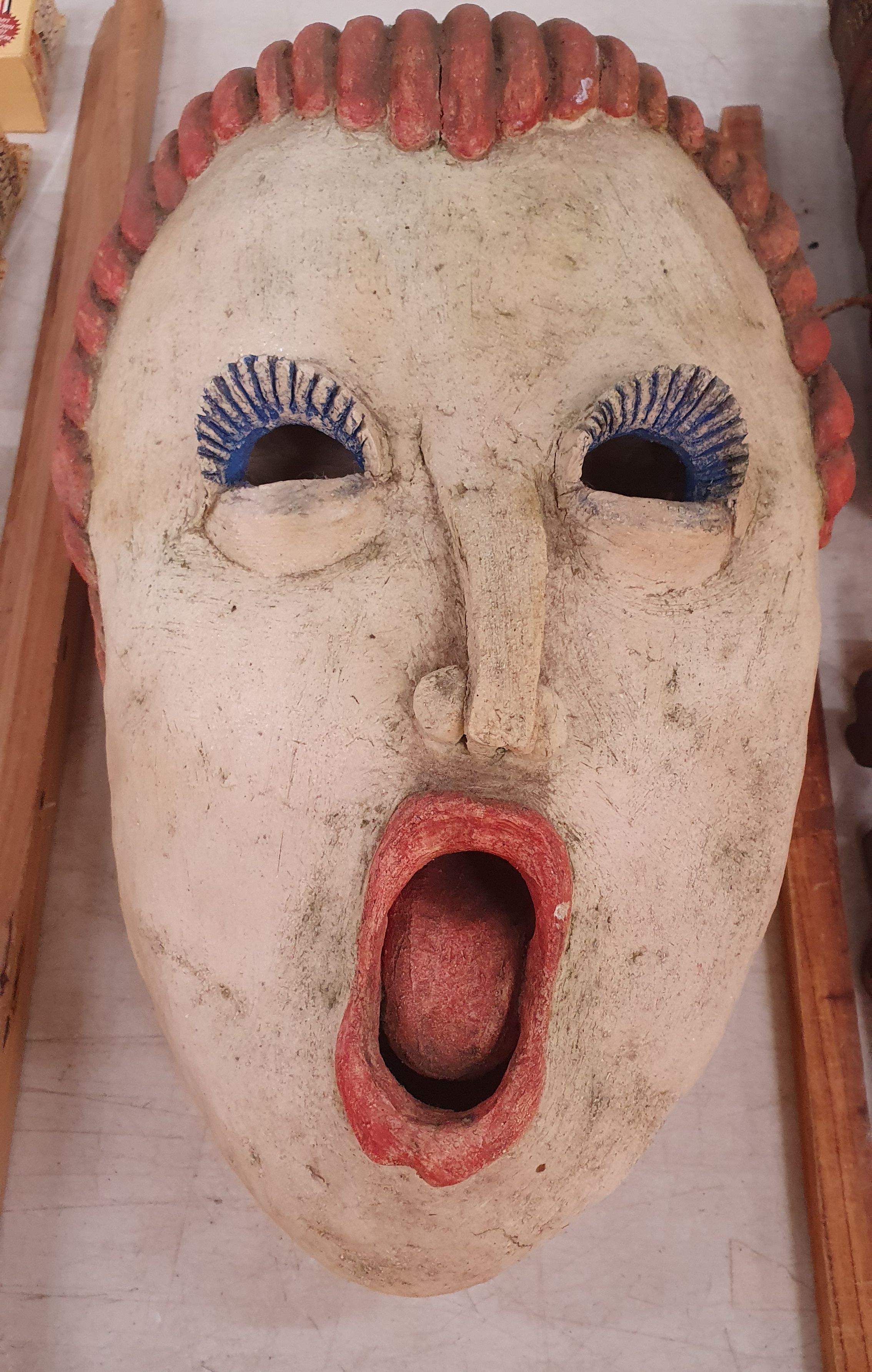 81 · A LARGE POTTERY THEATRICAL WALL ART MASK