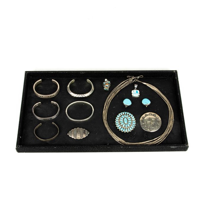 A Native American sterliing jewelry lot, including (5) cuff bracelets, most signed, including S