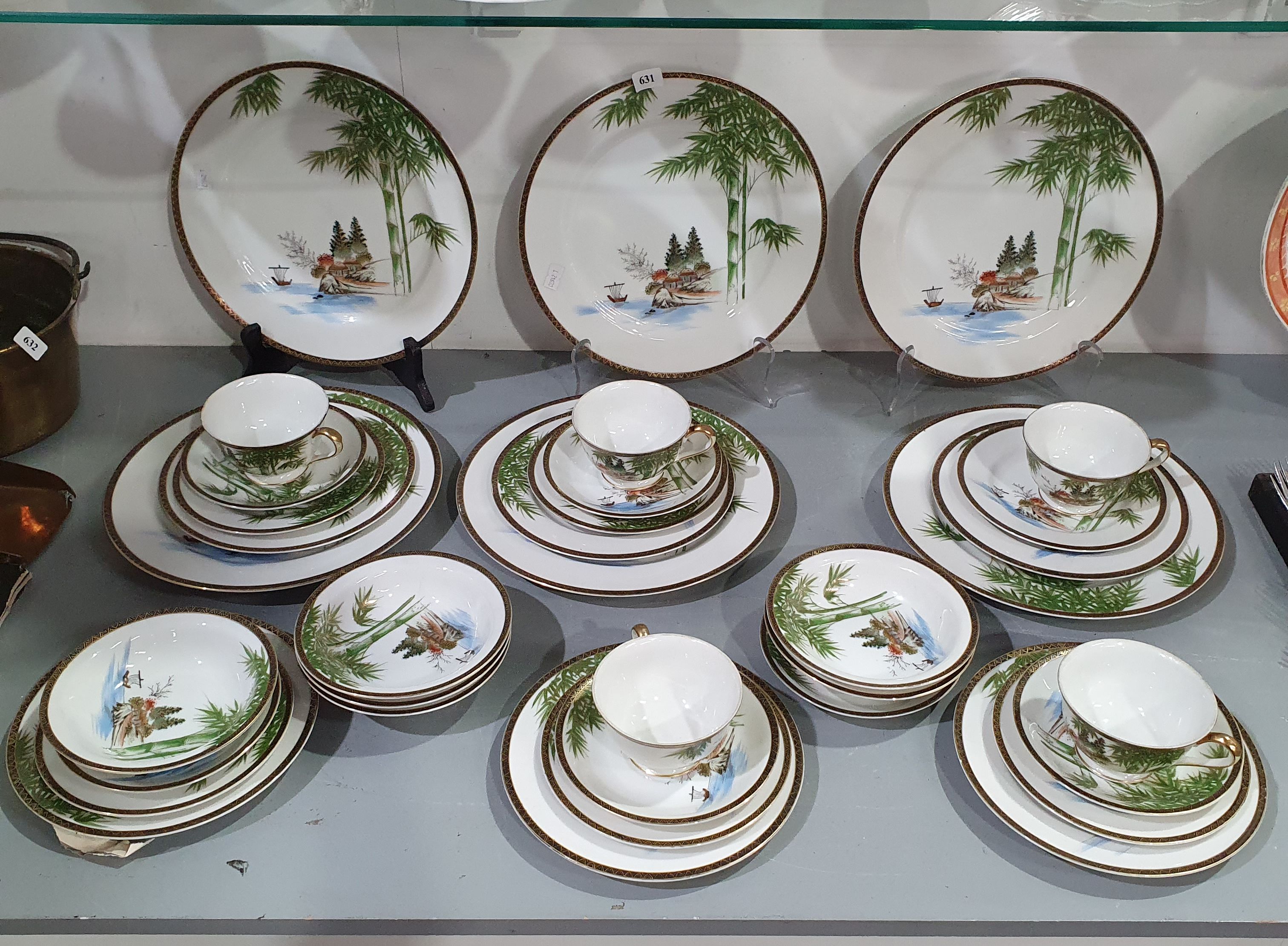 A Kutani Ns Porcelain Dinner Set