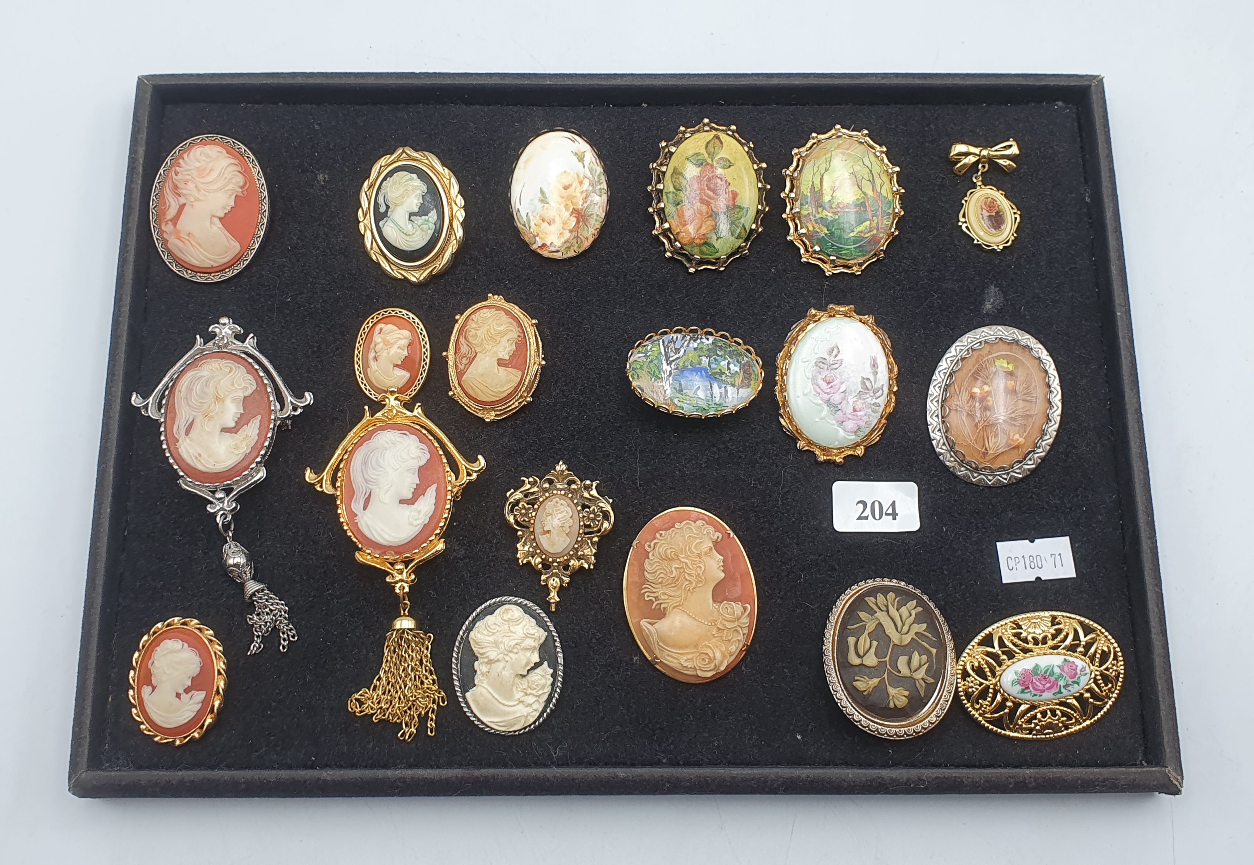 204 · A COLLECTION OF CAMEO BROOCHES AND OTHERS