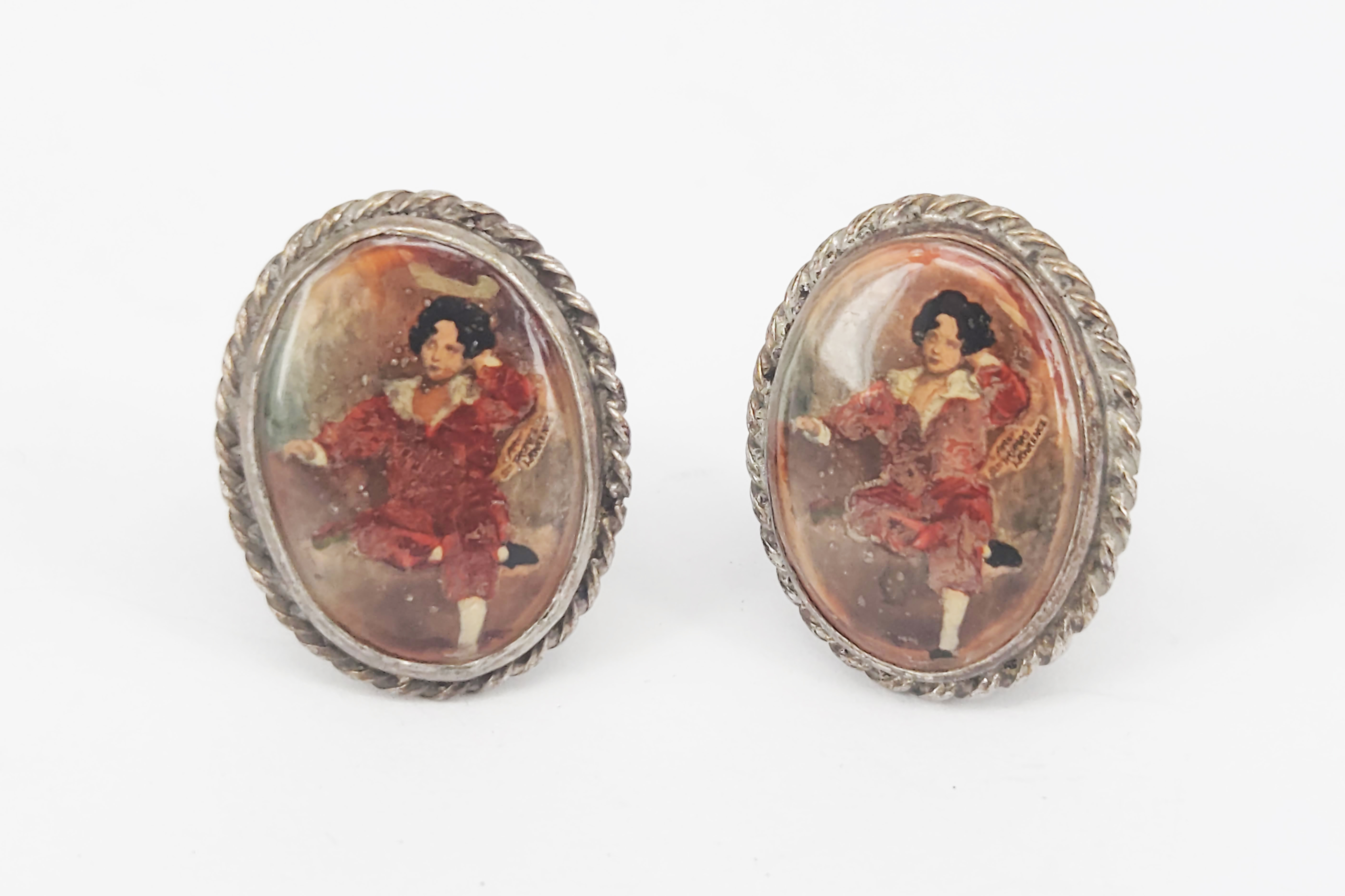 427 · A PAIR OF STERLING SILVER CLIP-ON EARRINGS