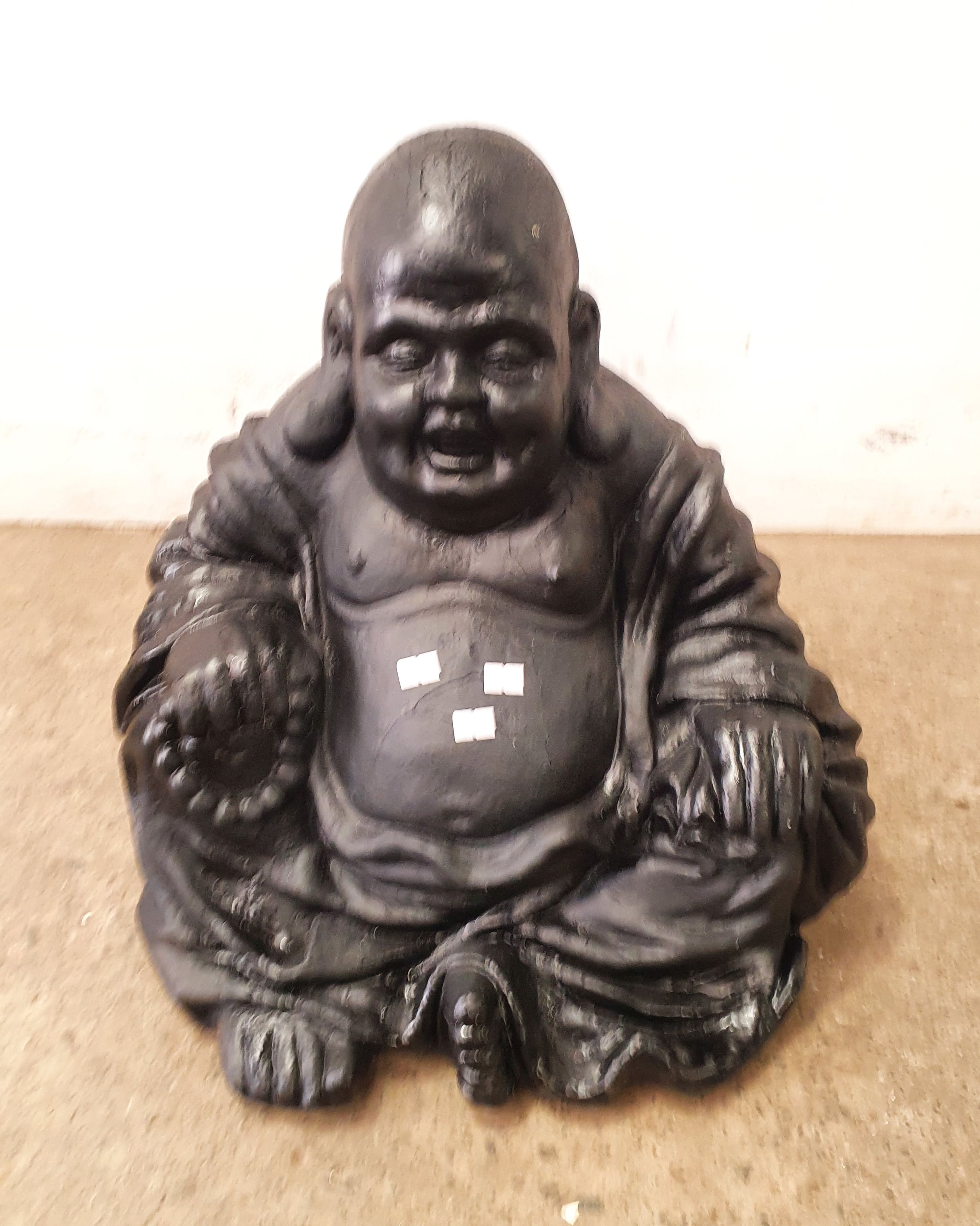 1001 · A FIBERGLASS BUDDHA