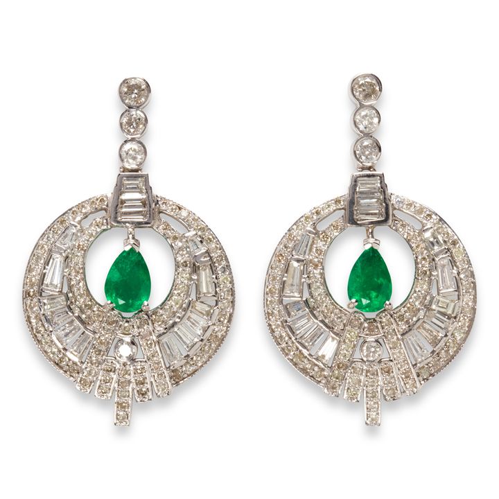 A pair of emerald, diamond and eighteen karat white gold earrings