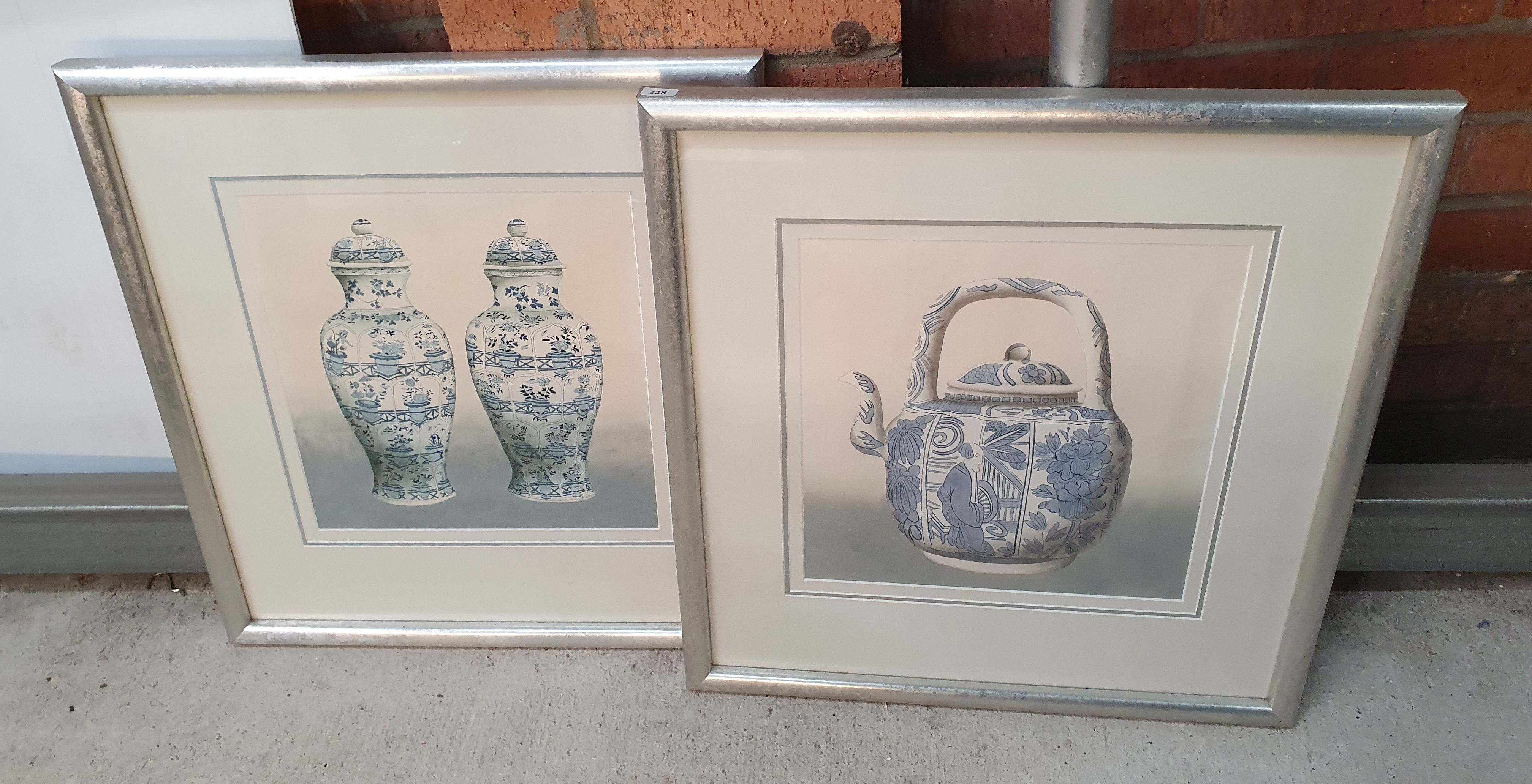 228 · A PAIR OF CONTEMPORARY FRAMED PRINTS
