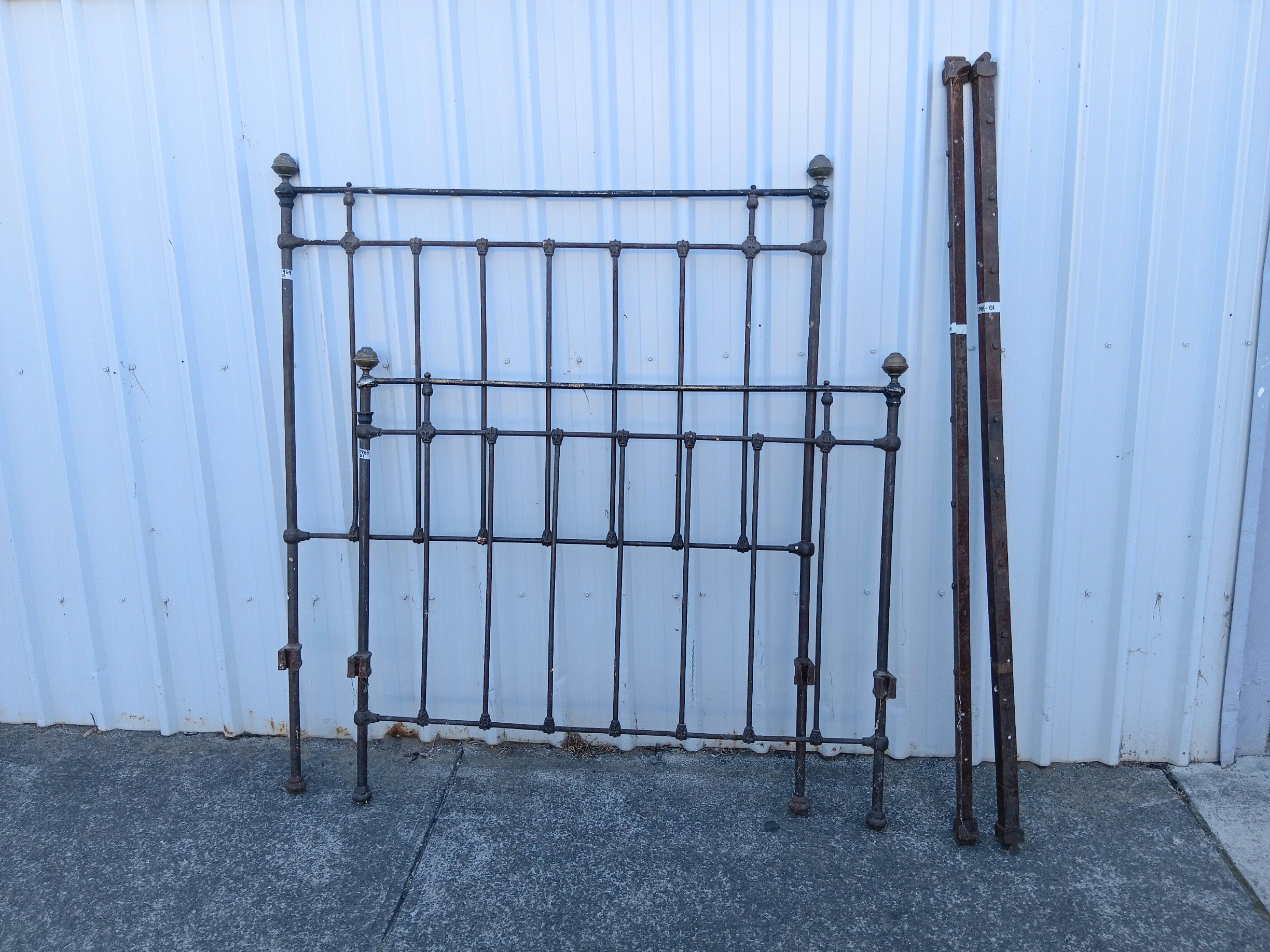An Antique Brass And Iron Bed