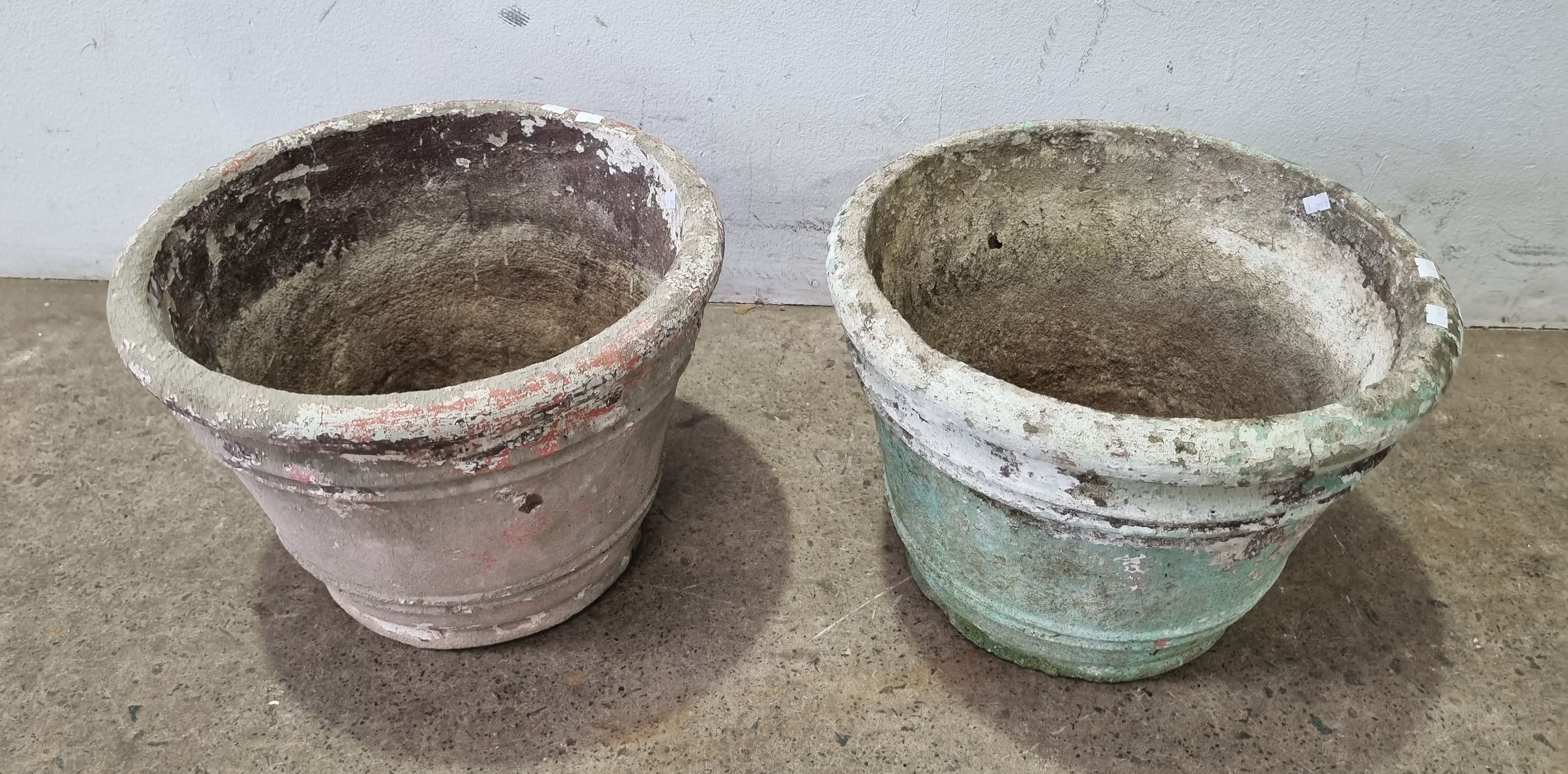 A Pair Of Concrete Plant Pots