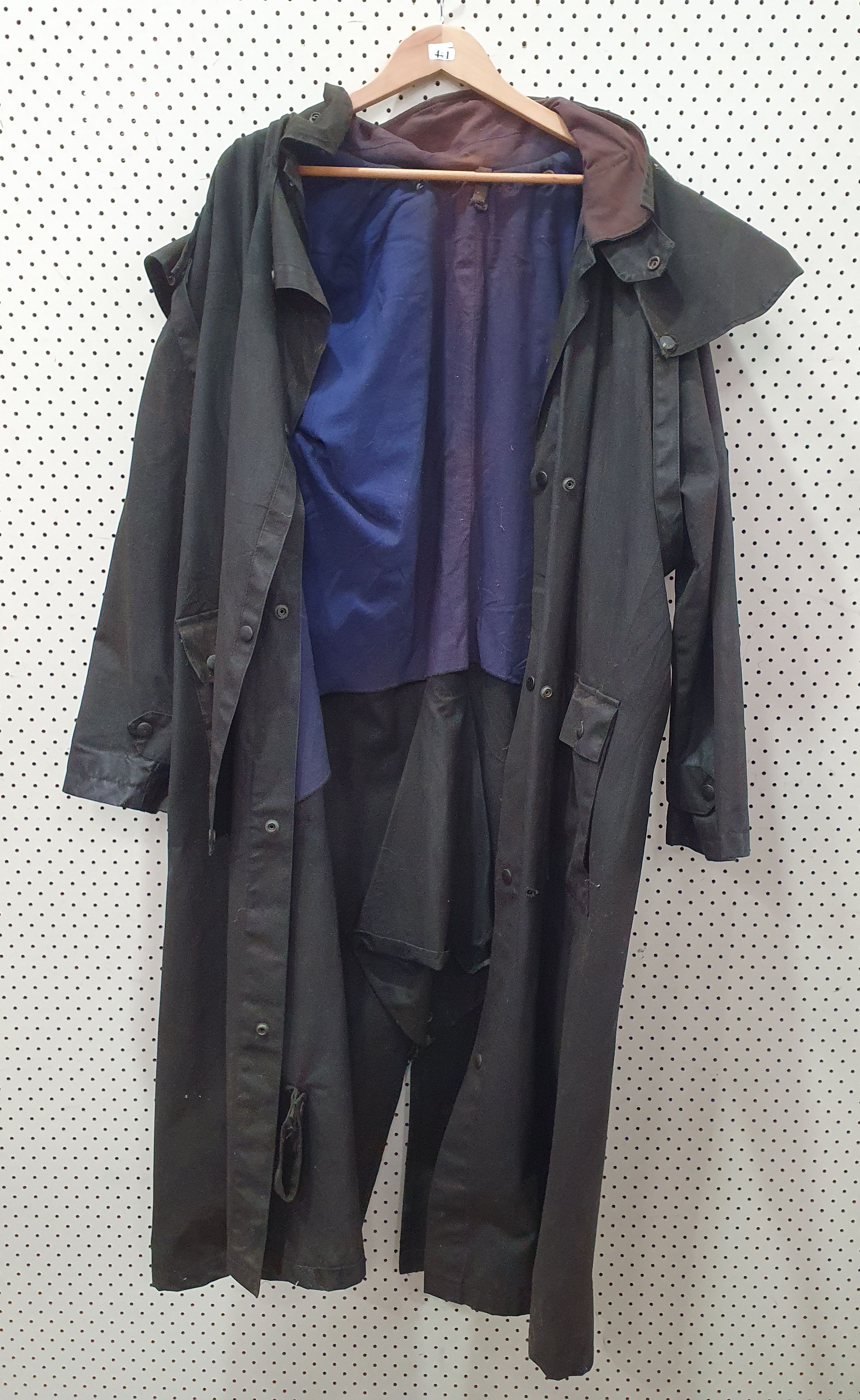 A BLACK TRENCH COAT