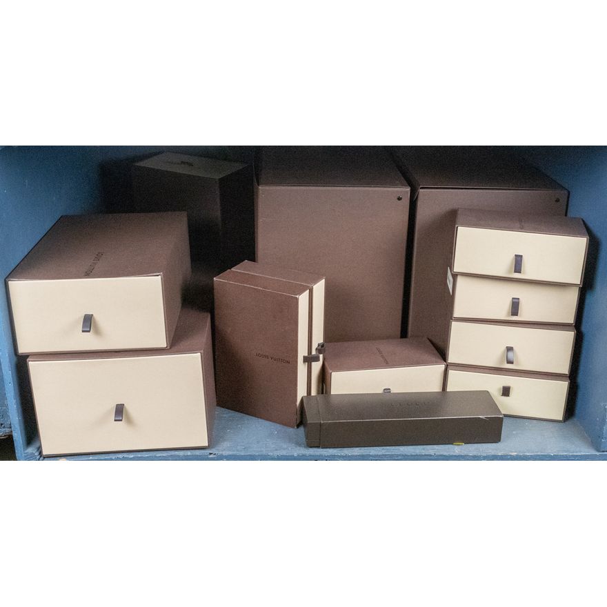 A group of Louis Vuitton factory boxes in various sizes