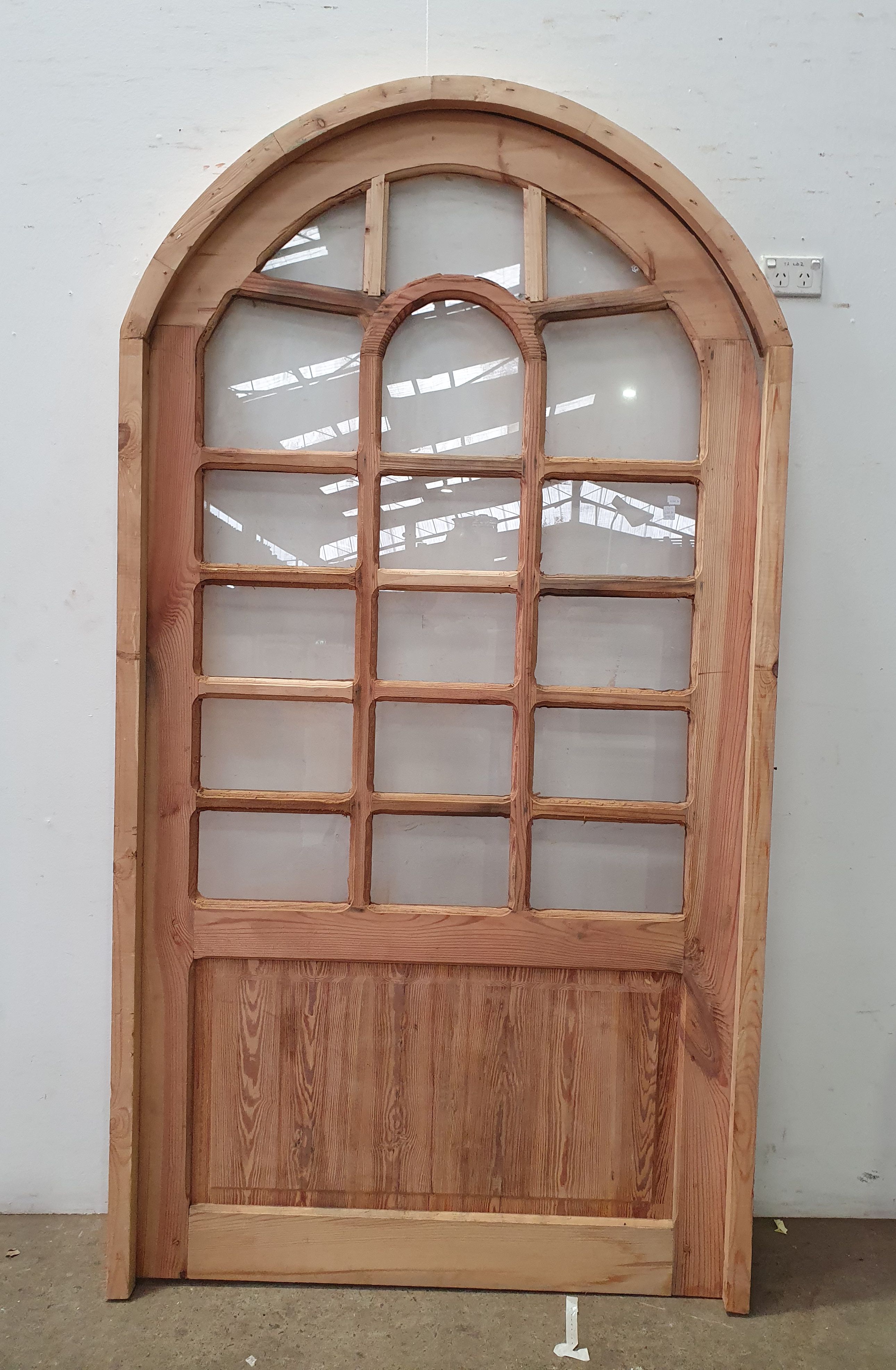 A Set Of Pine Dome Top Windows