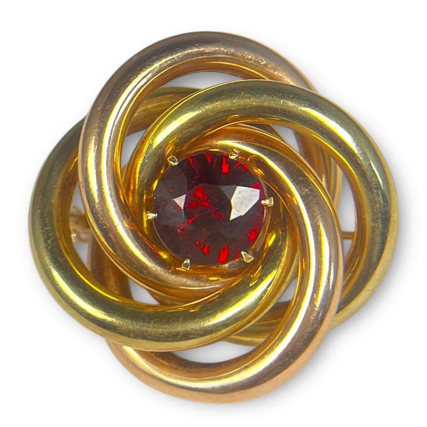 A 14k Gold and Garnet Wrapped Brooch