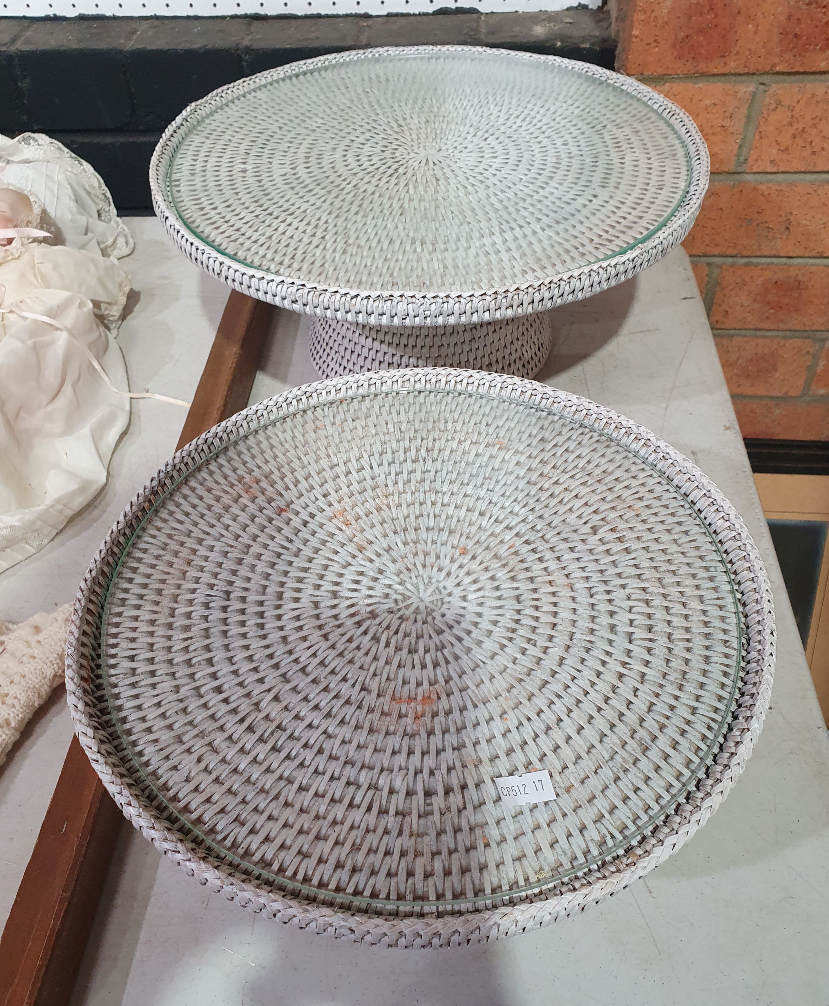 405 · A PAIR OF GRADUATING WHITE WICKER CAKE STANDS