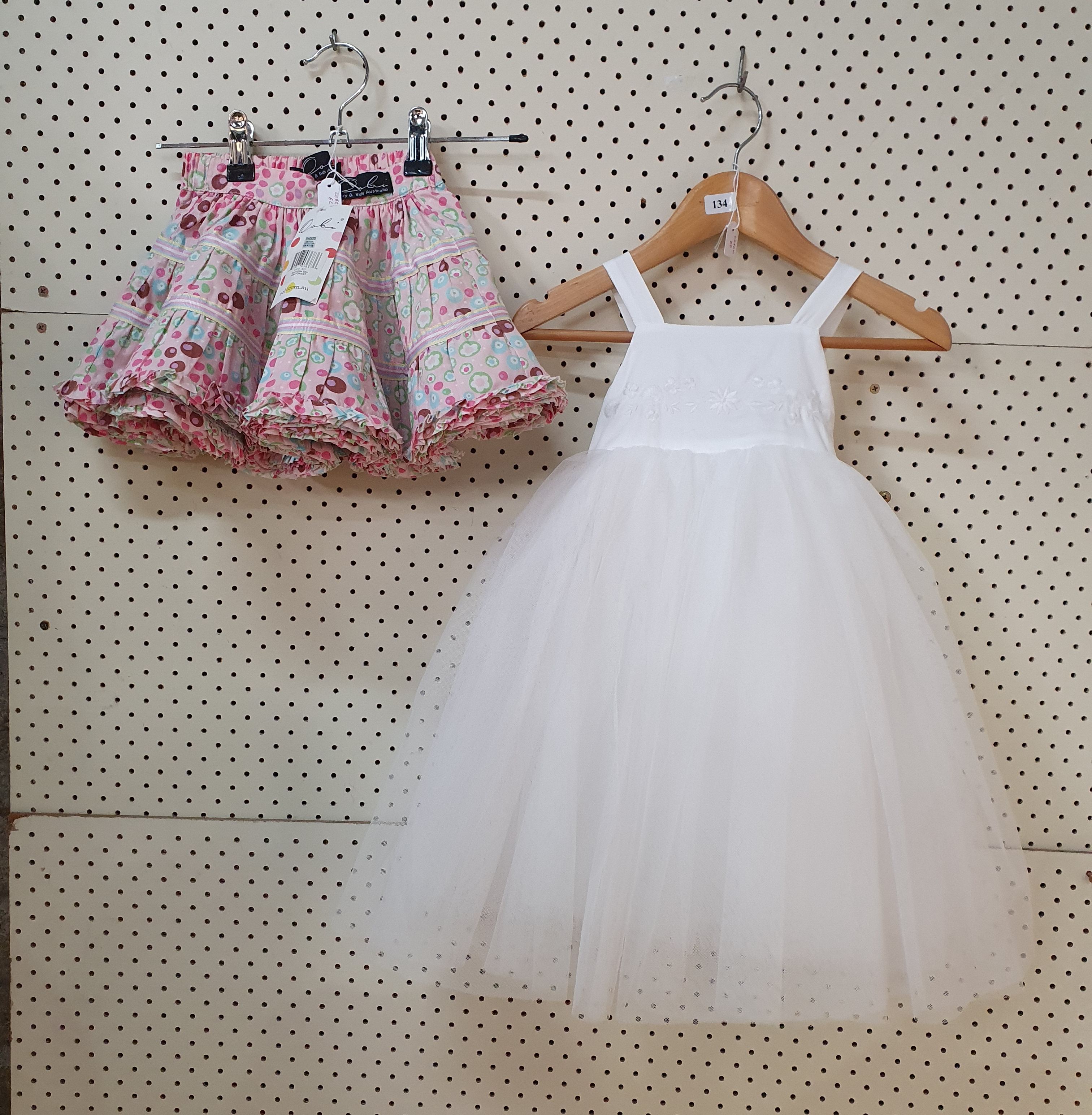 134 · TWO NEW ITEMS - 'BEBE' BY MINIHAHA TULLE DRESS WITH BLOOMERS AND AN 'OOBI' COTTON SKIRT