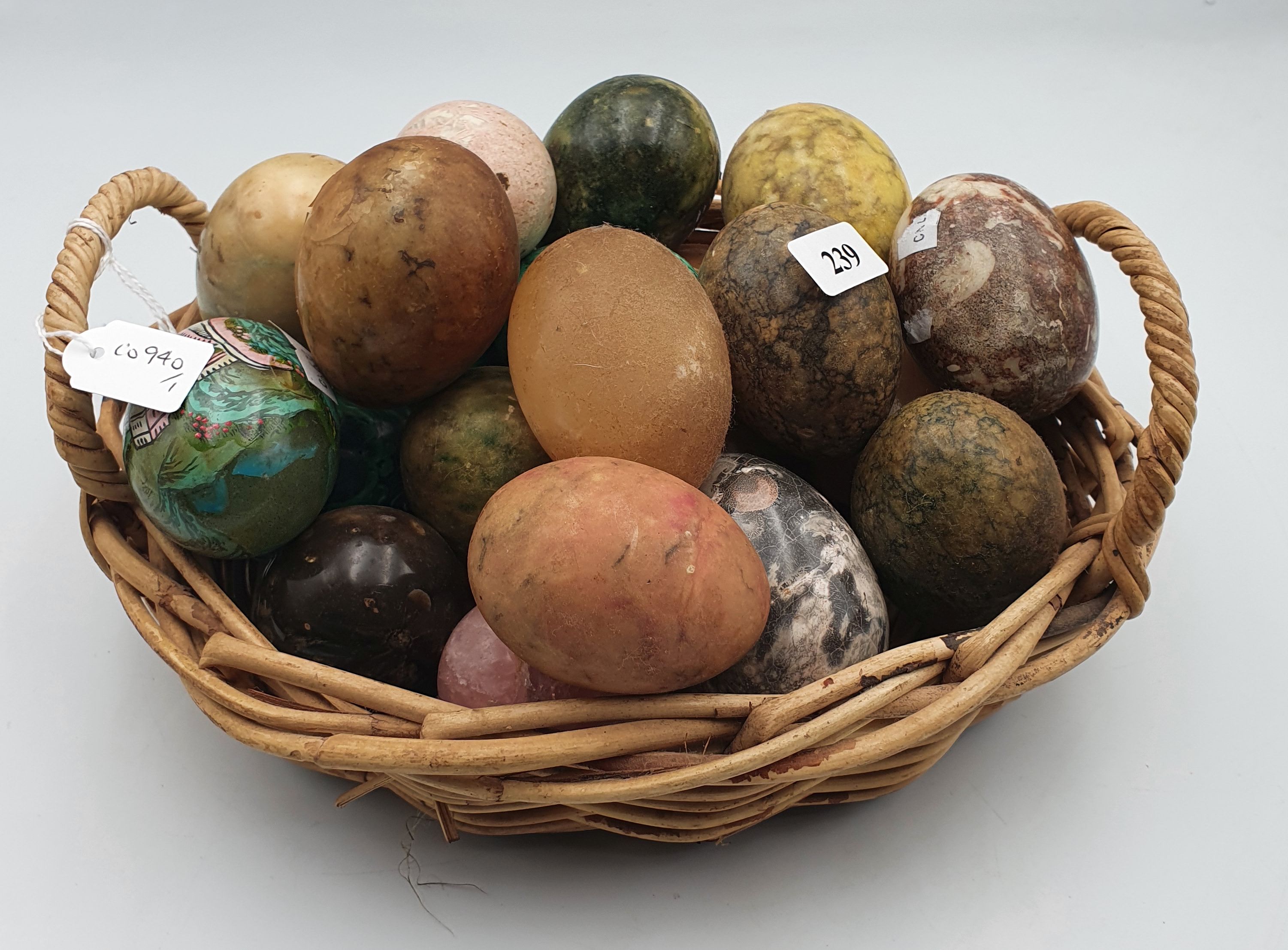 239 · A LARGE COLLECTION OF STONE EGGS