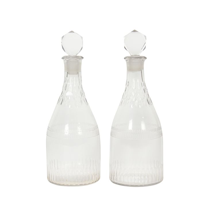 A pair of English George III cut glass decanters, late 18th/early 19th century