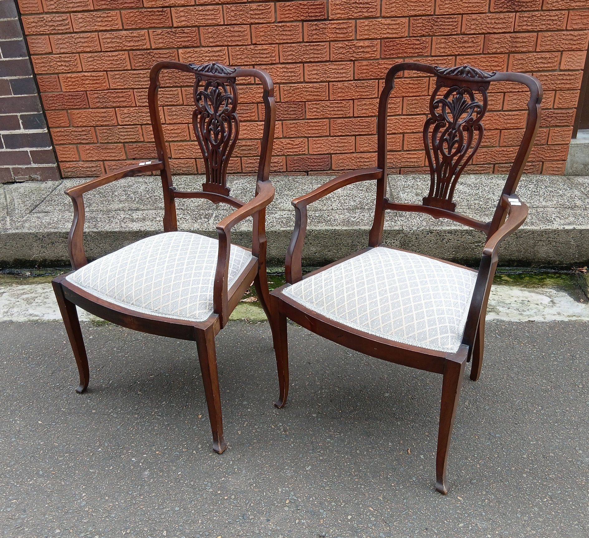 A Pair Of Chippendale Style Armchairs