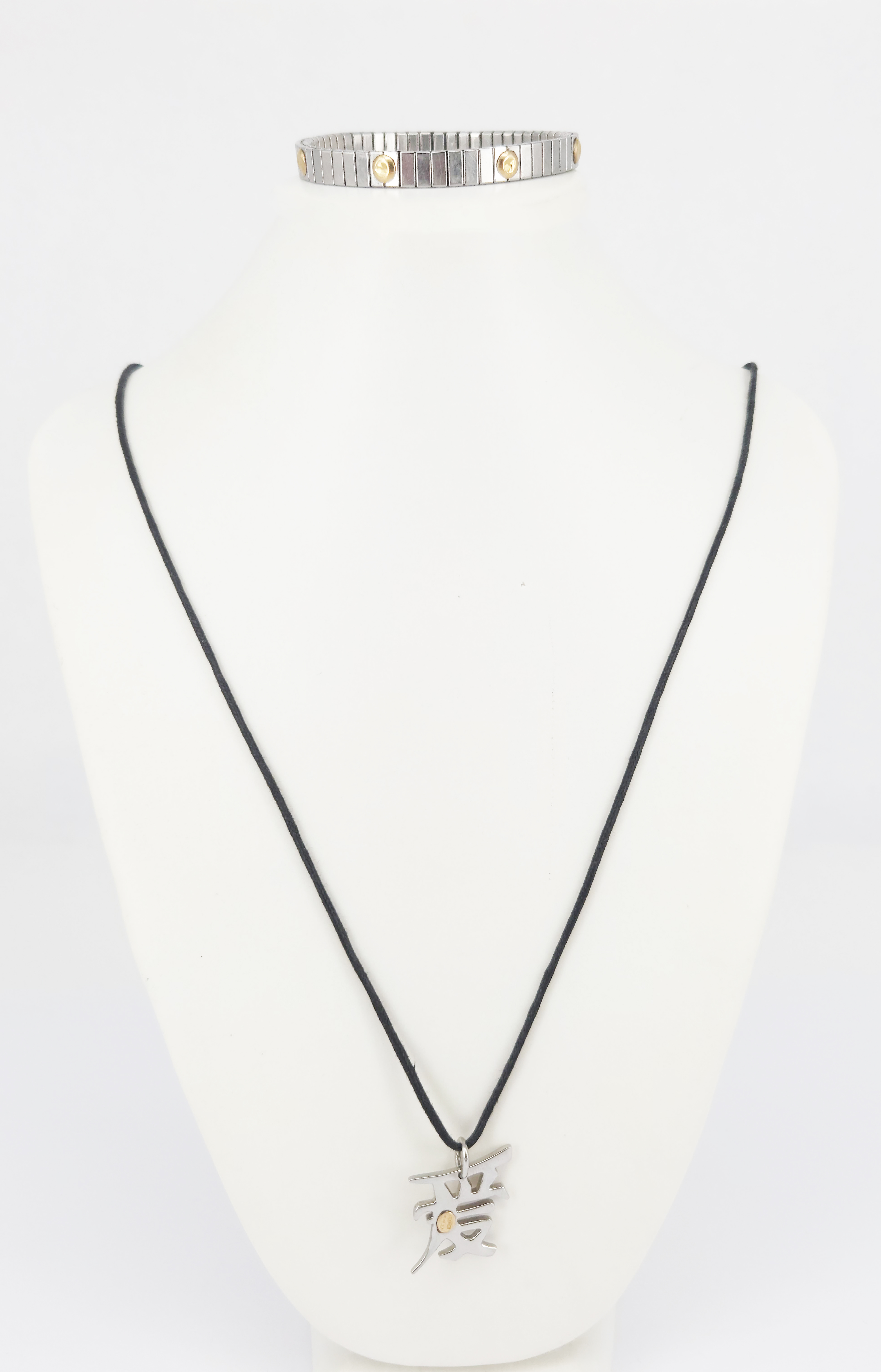 411 · TWO STAINLESS STEEL AND YELLOW GOLD JEWELLERY PIECES