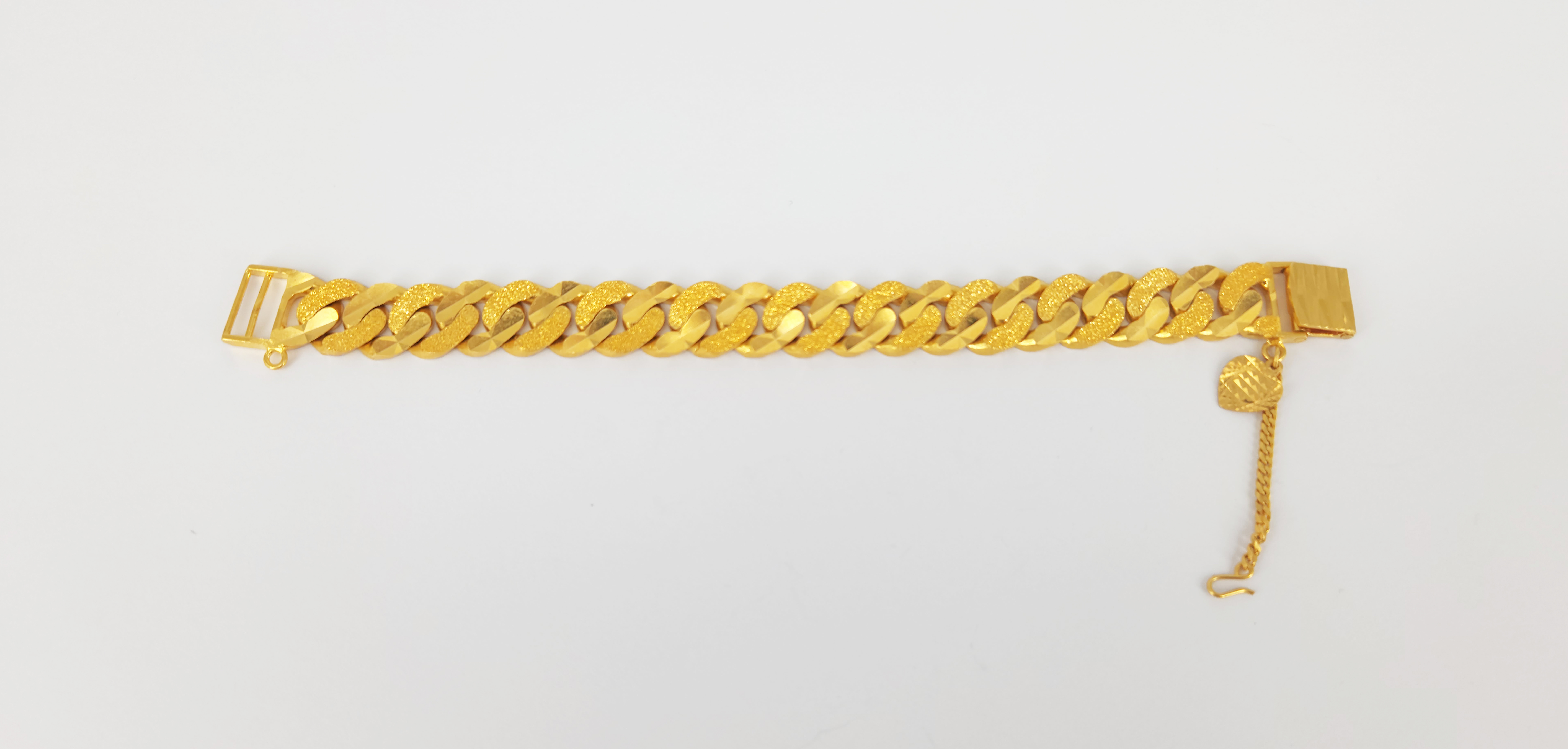 An Asian Yellow Gold Curb Link Bracelet