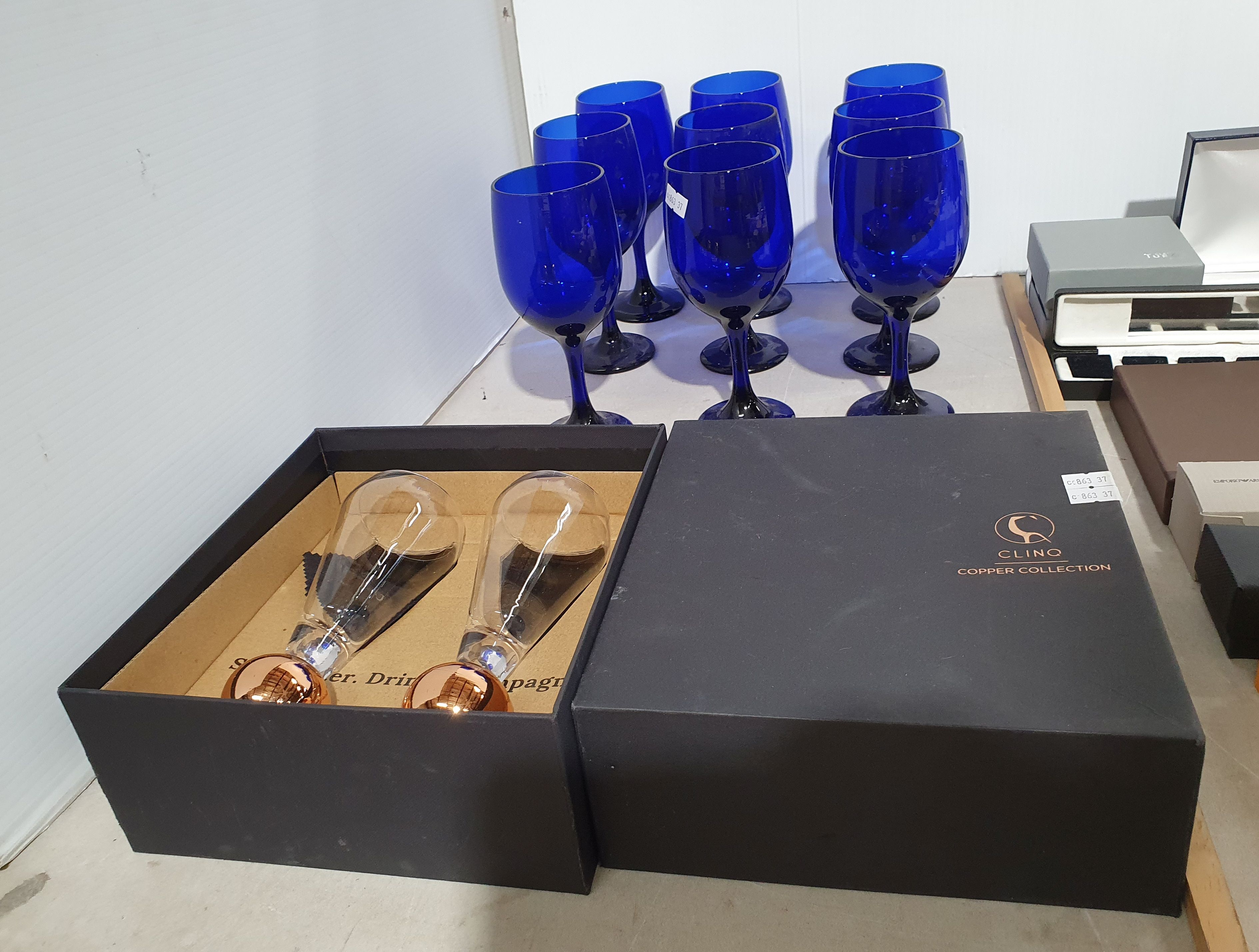 Nine Blue Glass Wine Goblets And Two Unique Champagne Glasses