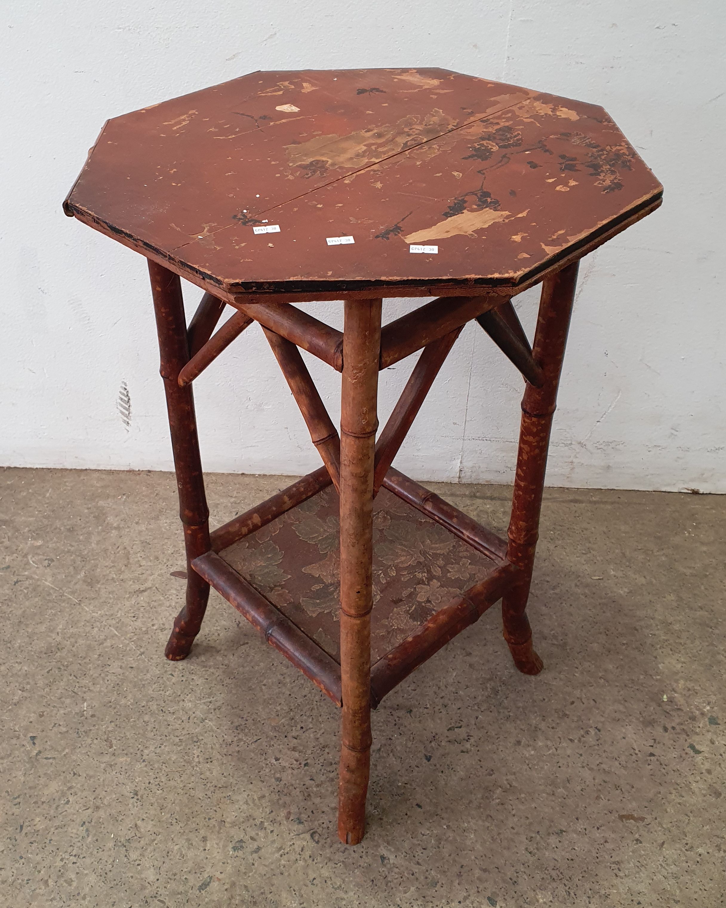 2069 · A TIGER CANE SIDE TABLE