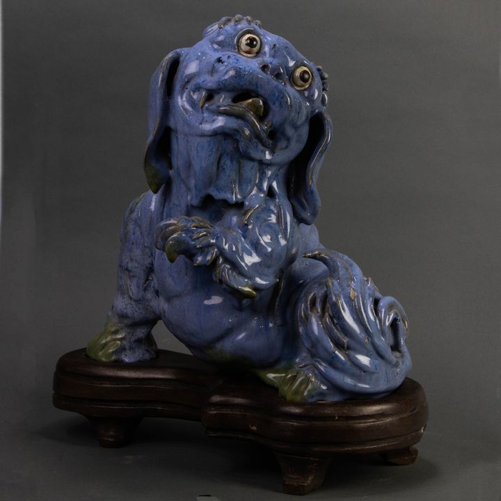 Chinese flambe glazed figure of a guardian lion
