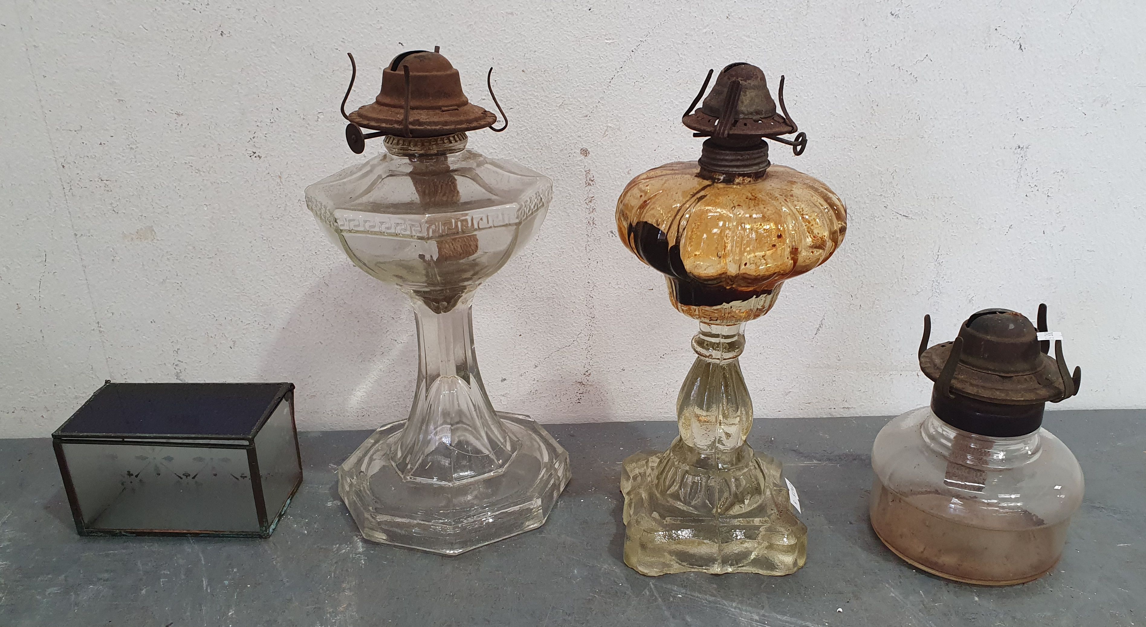 1247 · A GROUP OF THREE VARIOUS OIL LAMPS