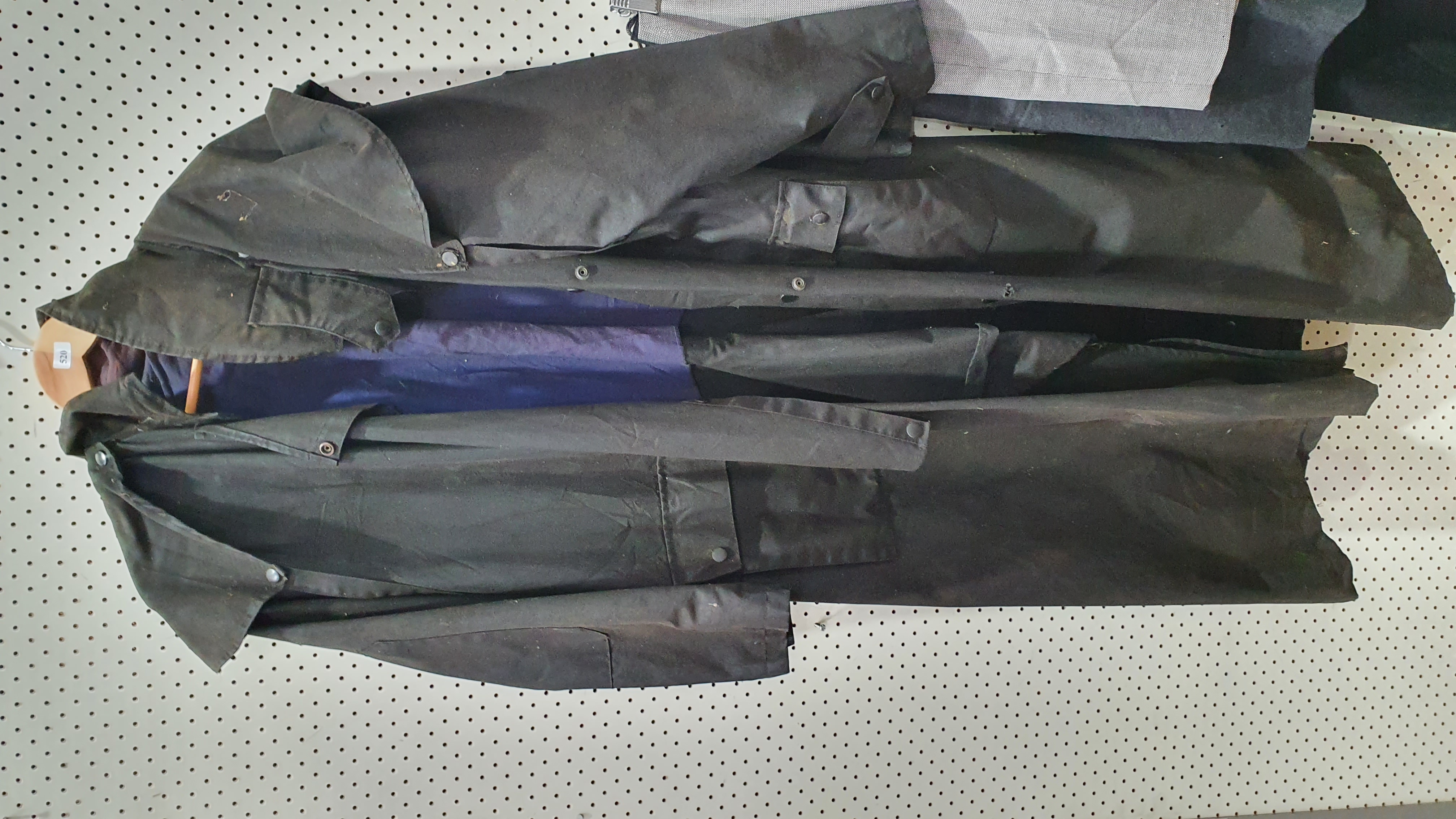 A BLACK TRENCH COAT