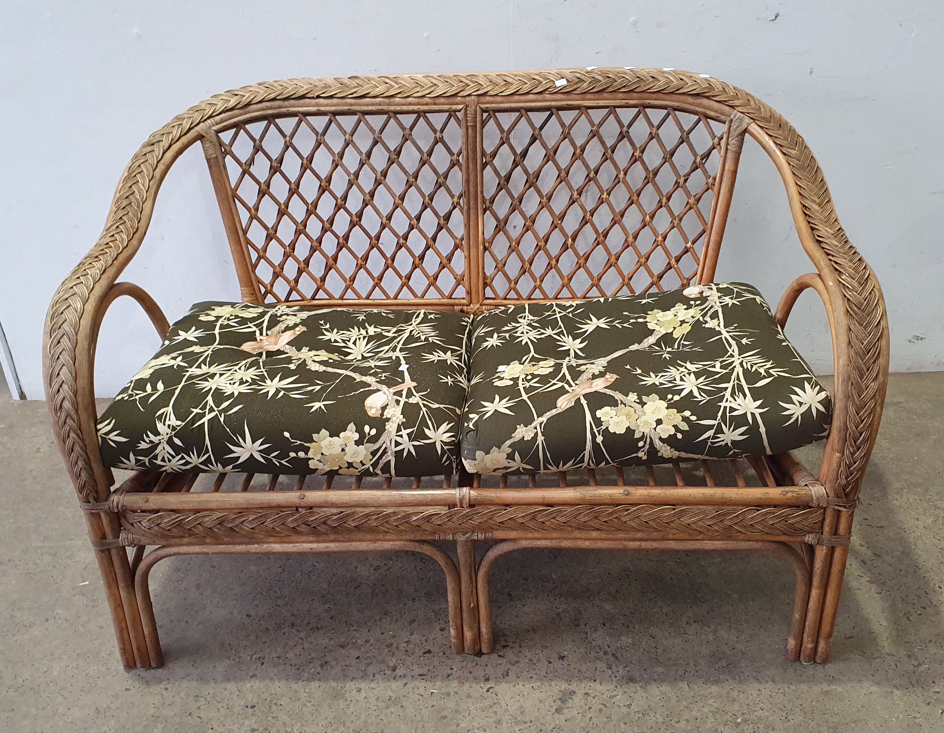 1026 · A TWO SEATER CANE LOUNGE