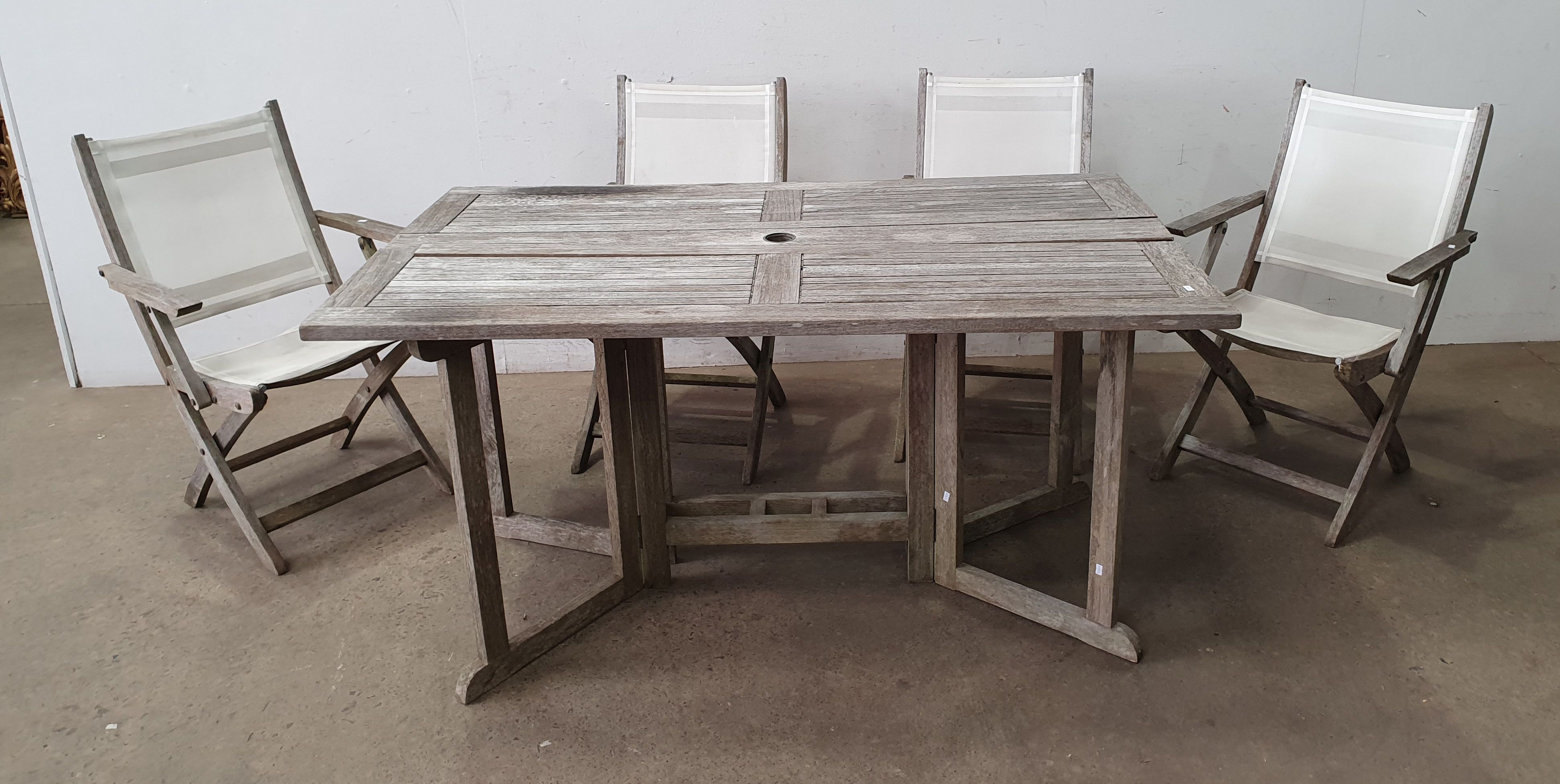 A Five Piece Outdoor Setting