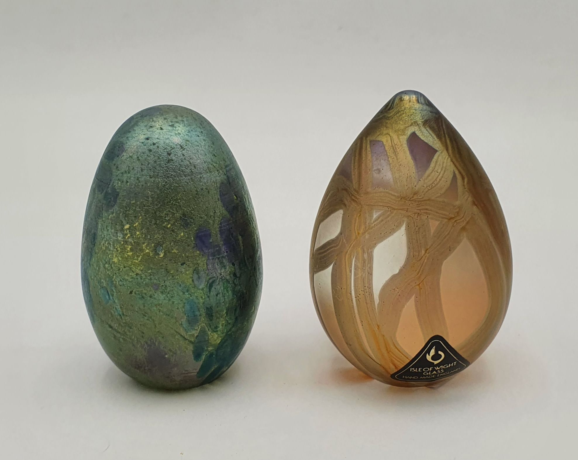 506 · TWO IRIDESCENT GLASS PAPERWEIGHTS