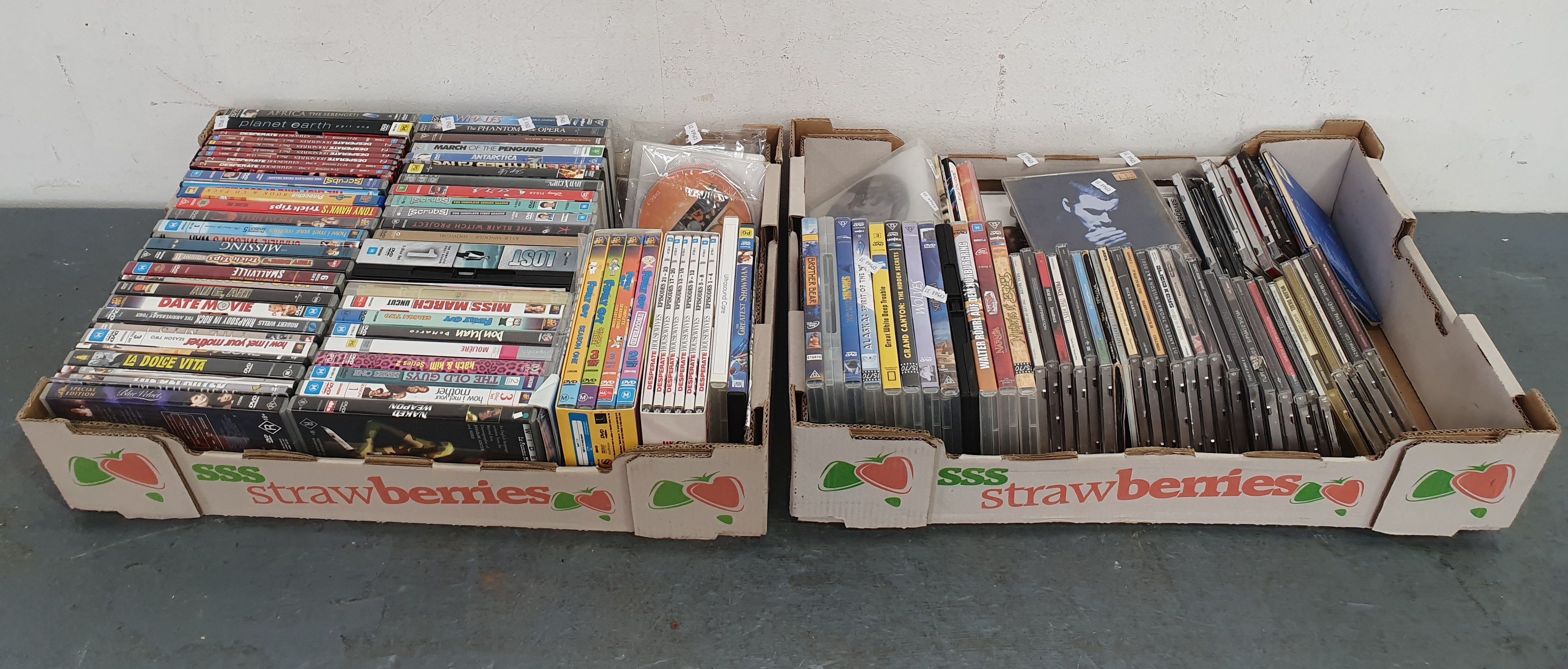 1208 · A GROUP OF CD'S/DVD'S