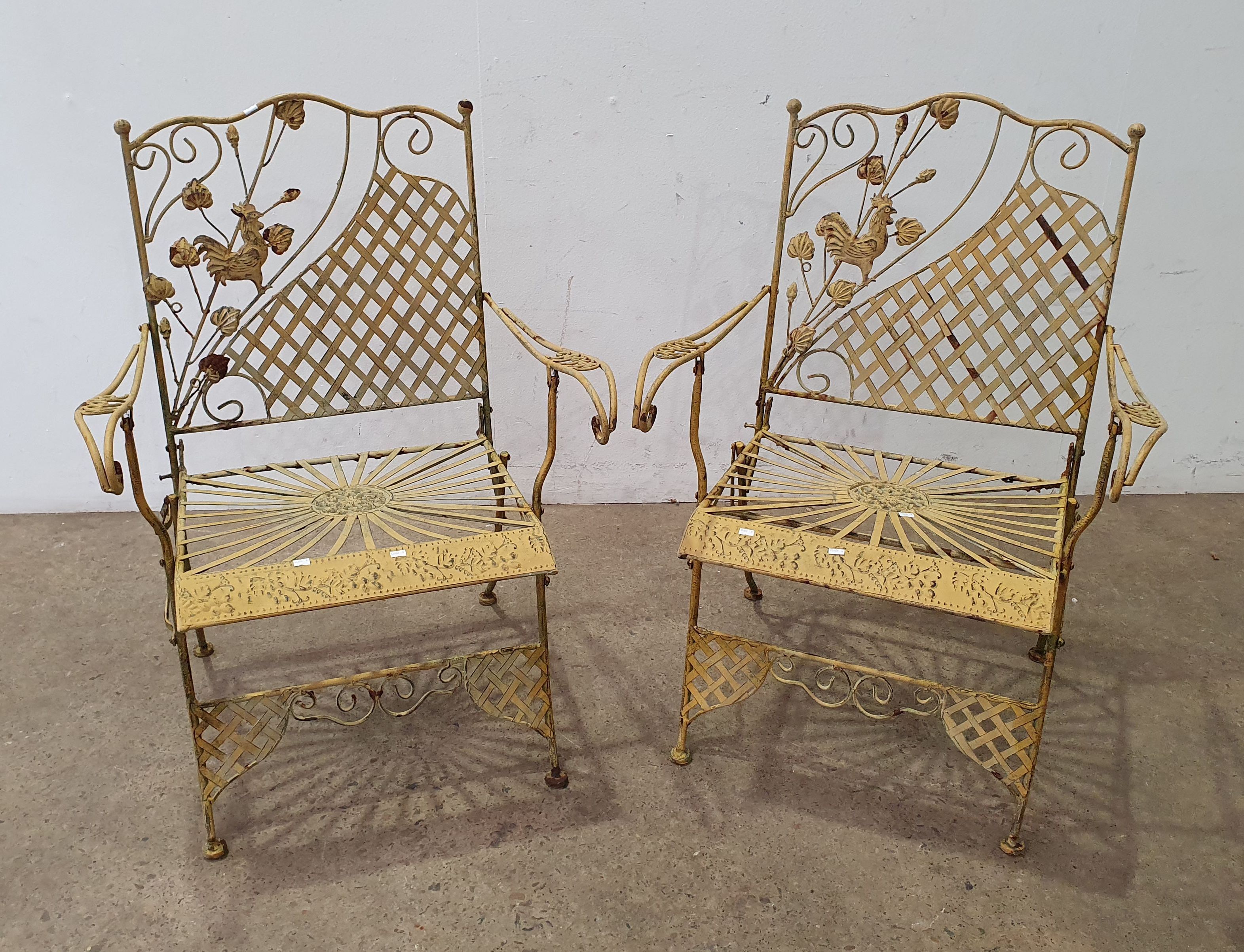 1065 · A PAIR OF DECORATIVE METAL FOLDABLE YELLOW CHAIRS