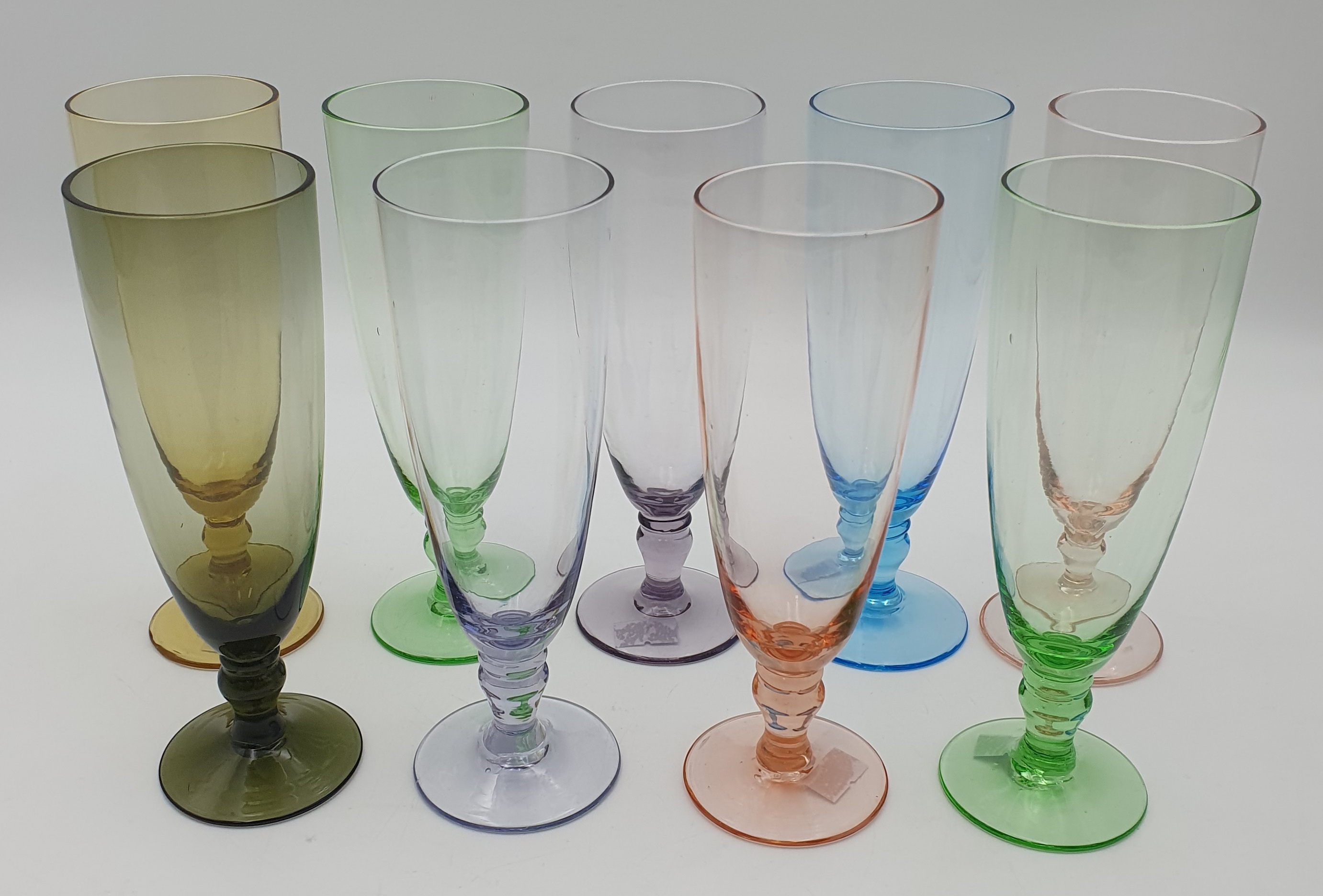 550 · NINE VINTAGE HARLEQUIN GLASSES