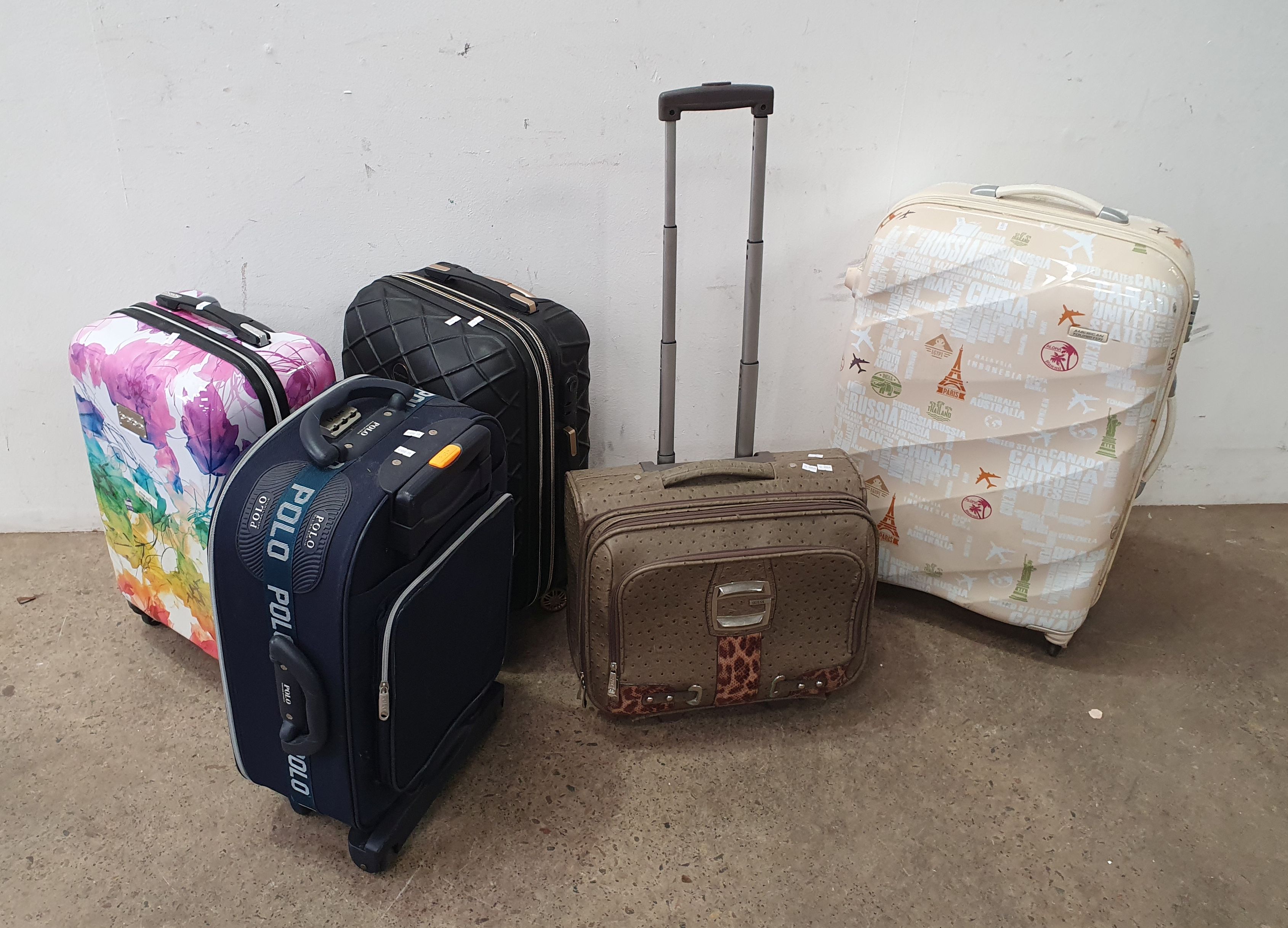 Five Various Suitcases