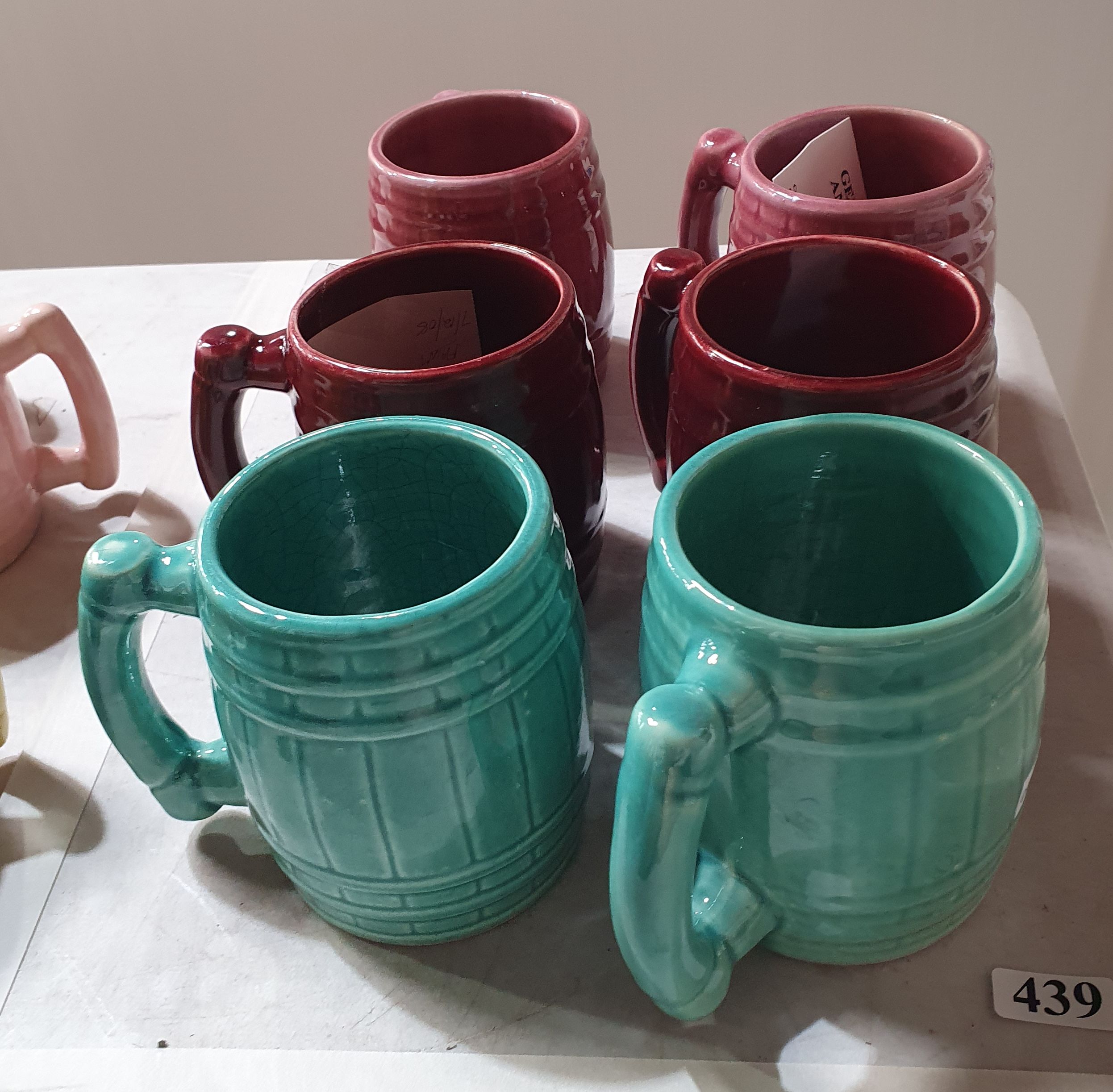 439 · A GROUP OF SIX MCP BARREL MUGS