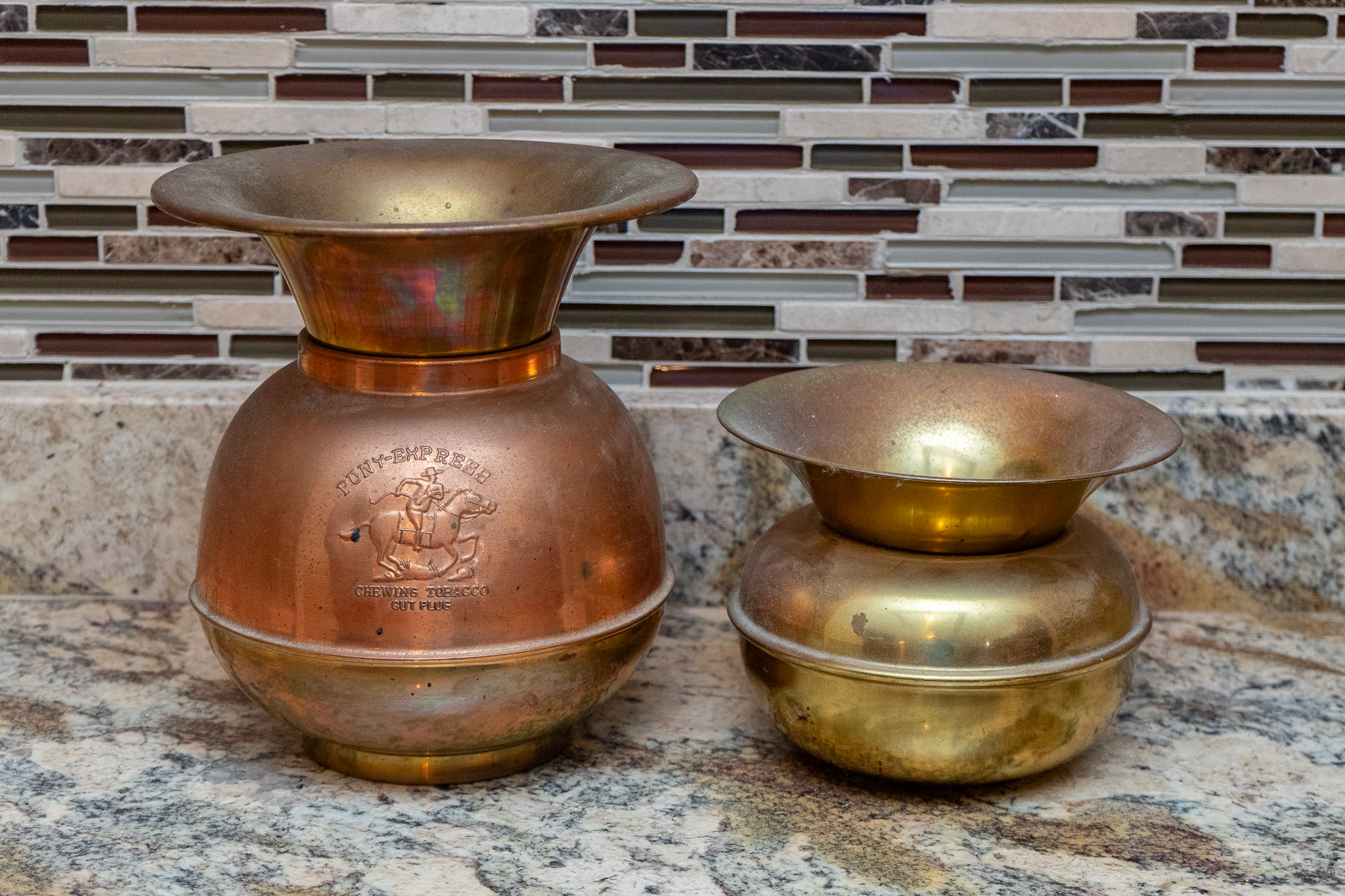 Two Brass Spittoons | Harritt Group, Inc