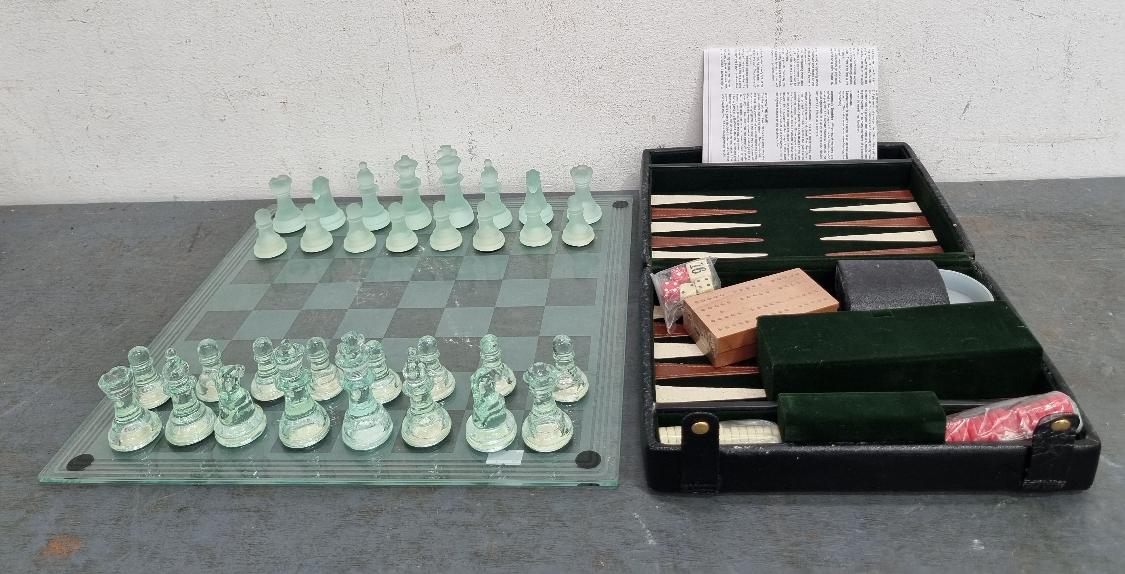 A GLASS CHESS SET WITH A BACKGAMMON SET