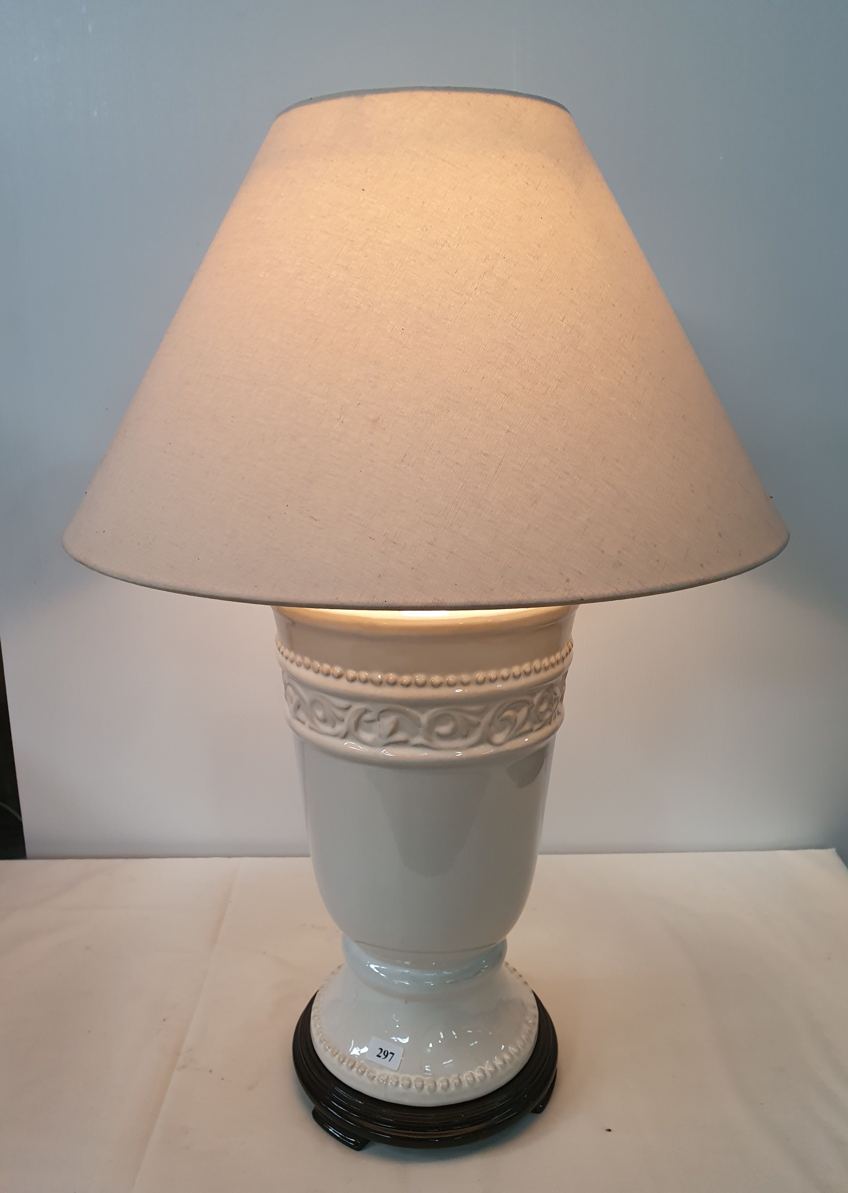 297 · A GLAZED CERAMIC TABLE LAMP AND SHADE