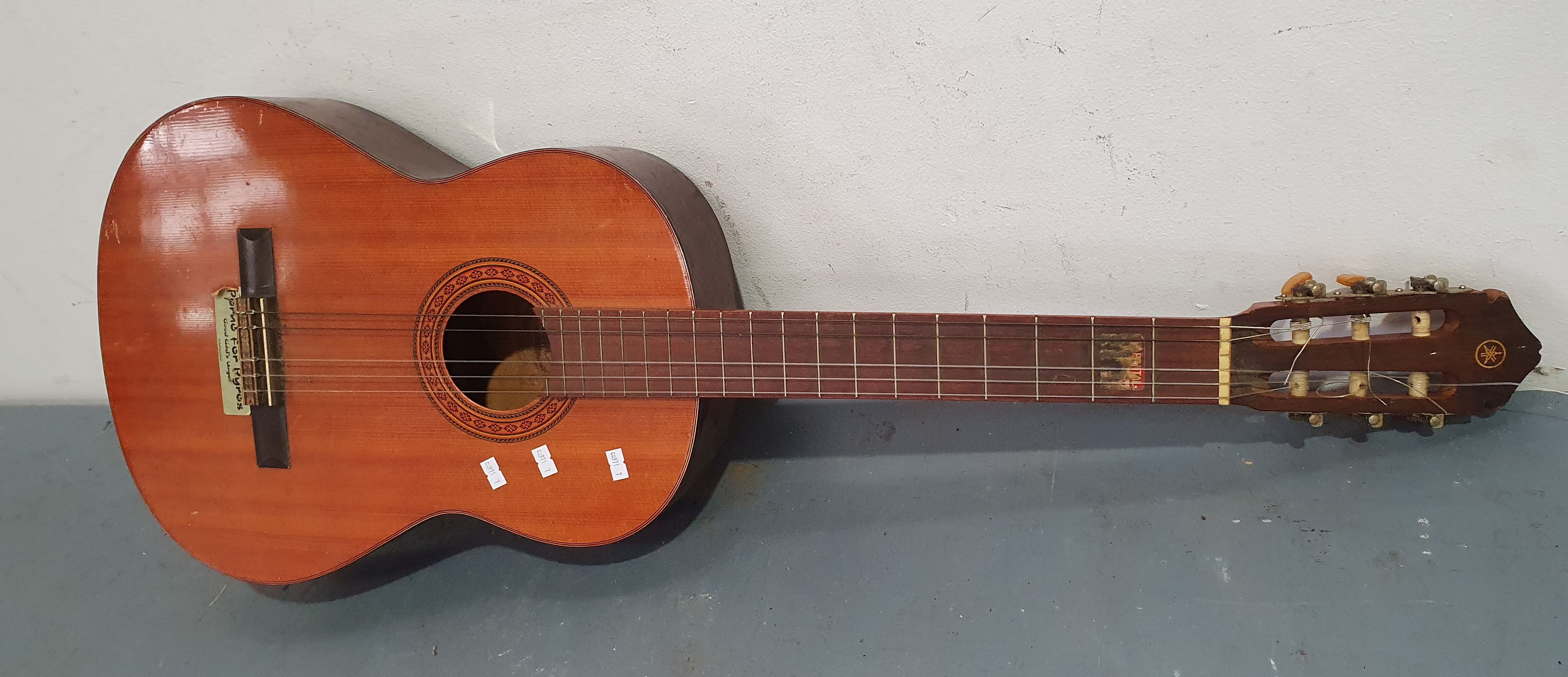 A YAMAHA GA60 GUITAR