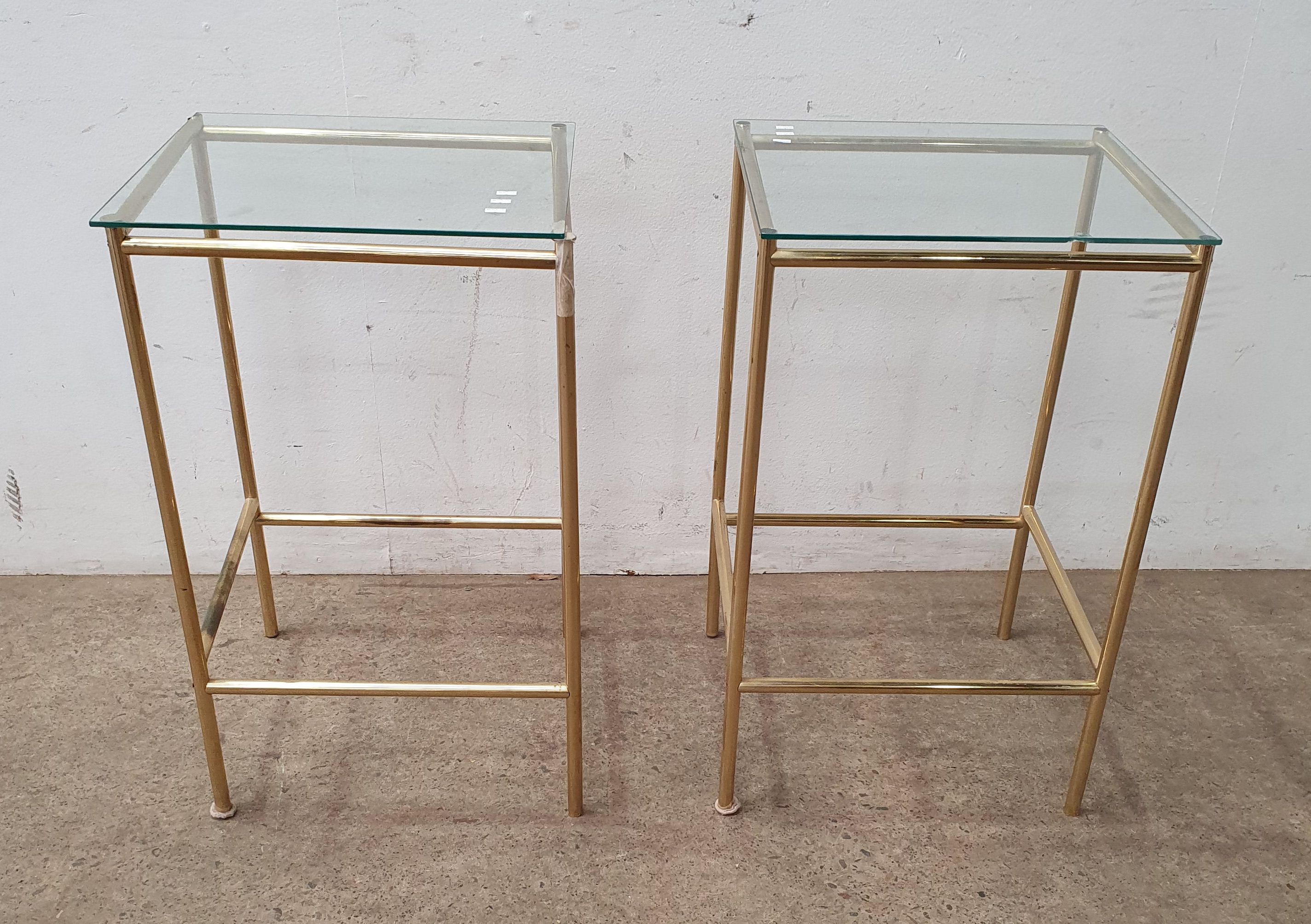 A Pair Of Tube Base Side Tables