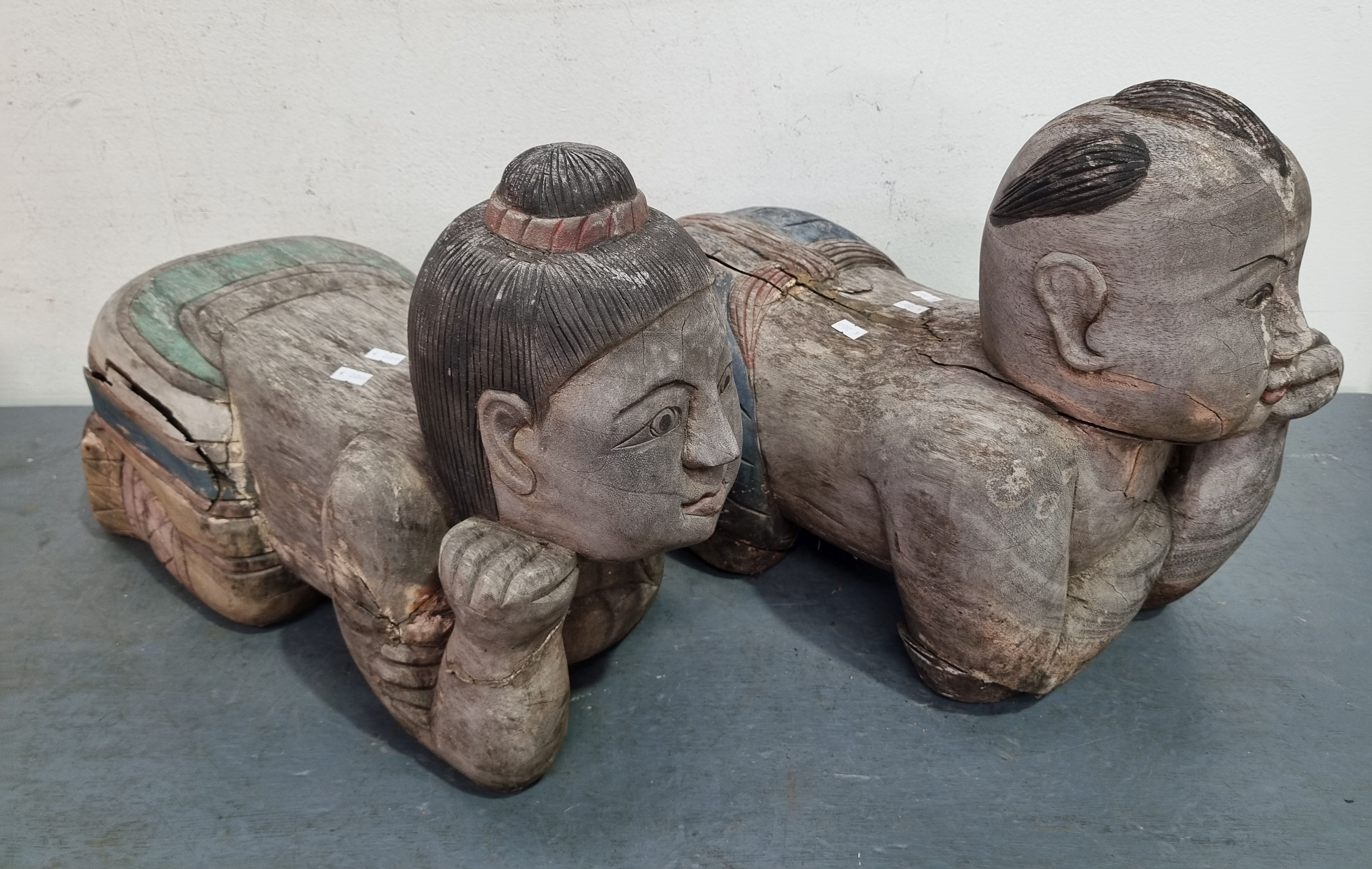A Near Pair Of Wooden Buddha Figurines