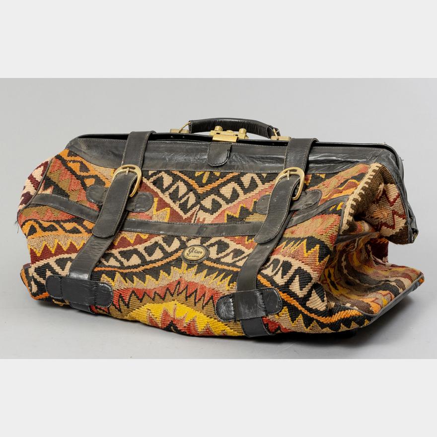 A vintage duffle bag | Ashbeys Galleries